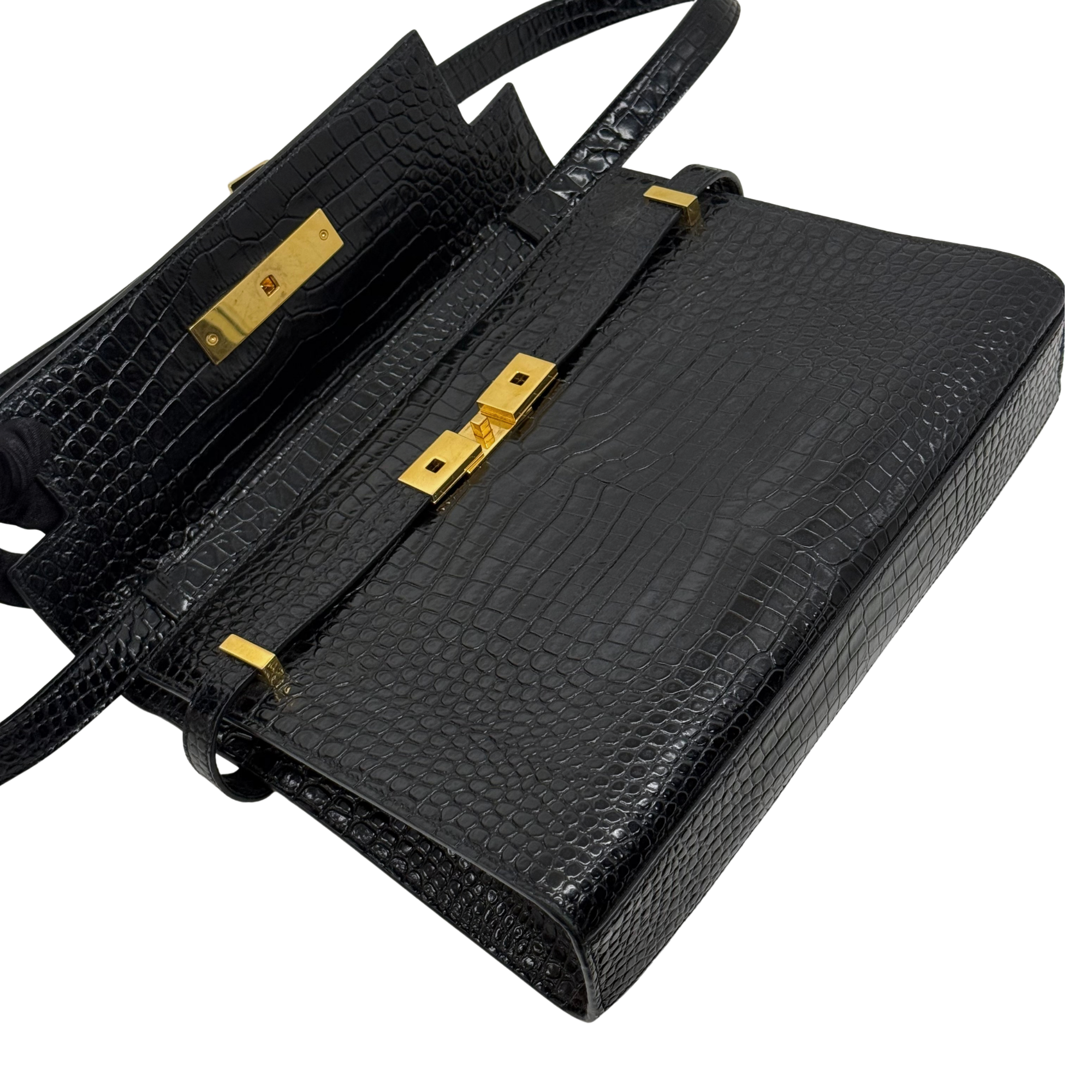 Black croc-embossed leather crossbody bag with gold-tone hardware and strap