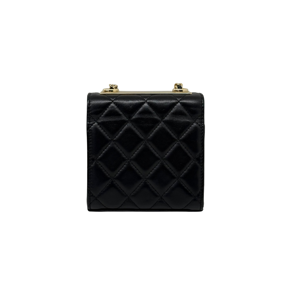 Black Chanel quilted square mini bag back with diamond pattern and gold posts
