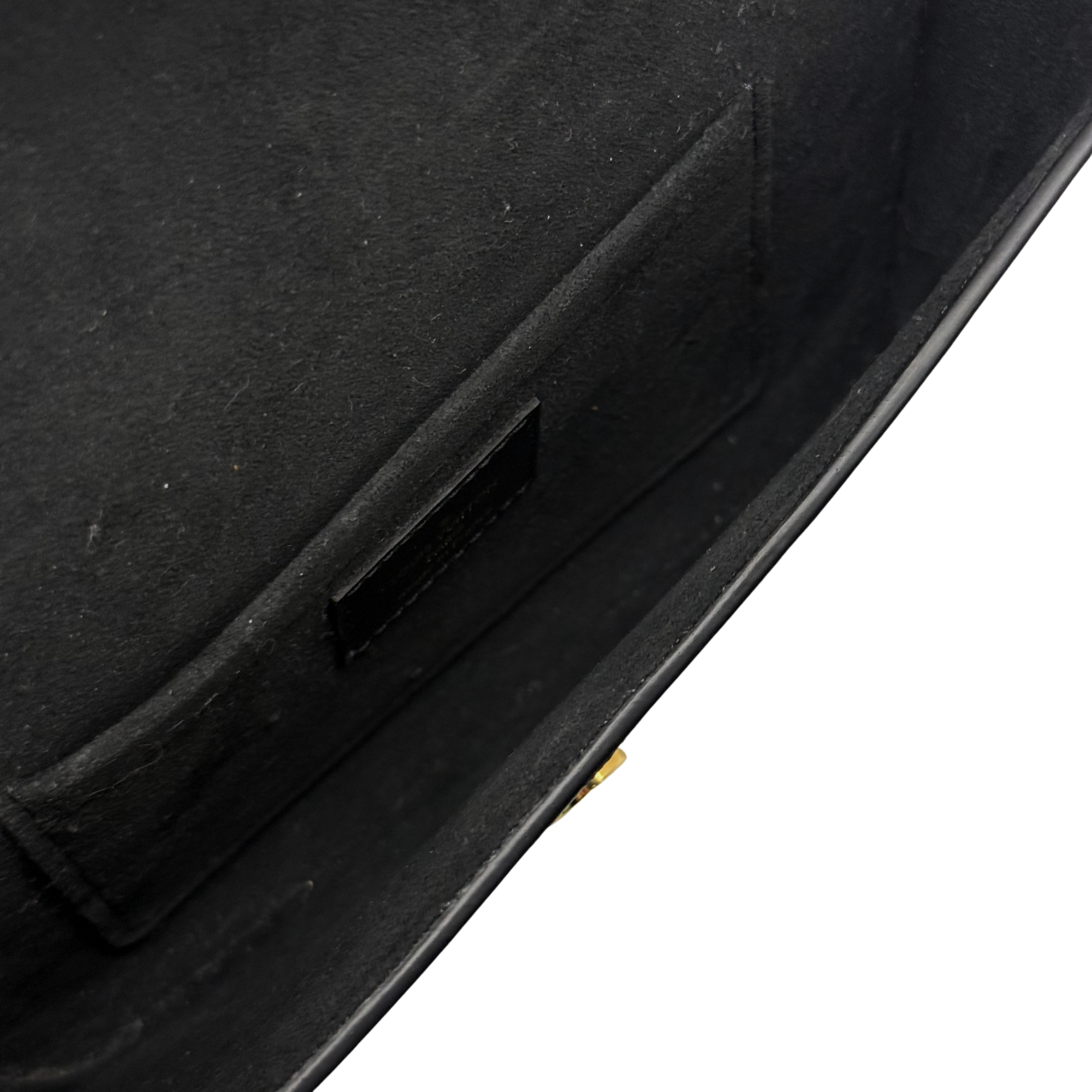 Black leather corner seam with stitched panel and edge trim