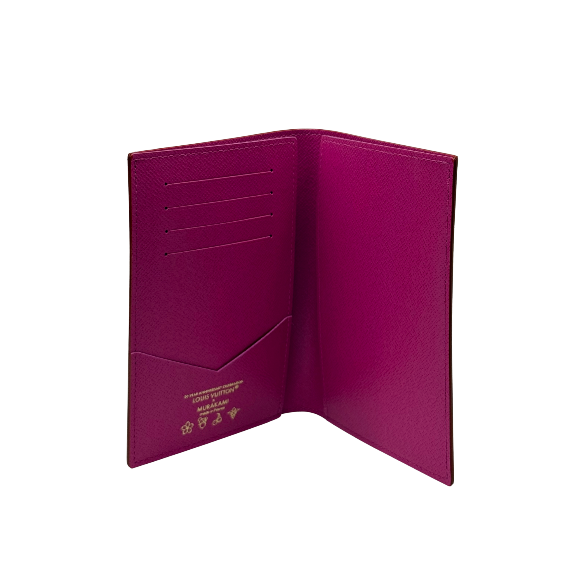 Fuchsia Louis Vuitton card holder opened, showing multiple card slots inside