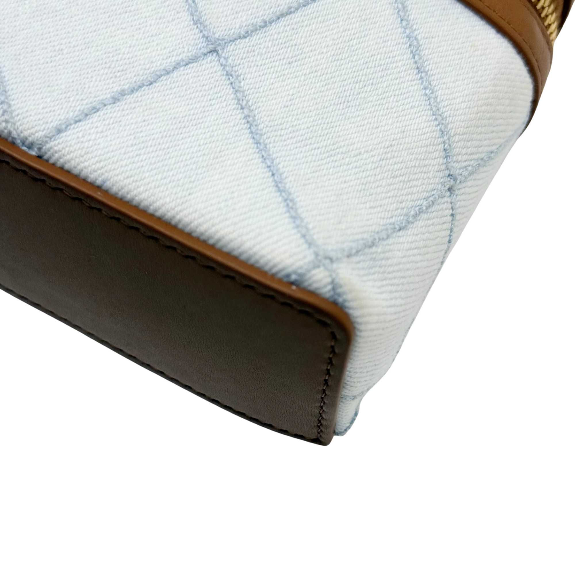 Chanel light-blue quilted fabric and brown leather trim with stitched corner seam