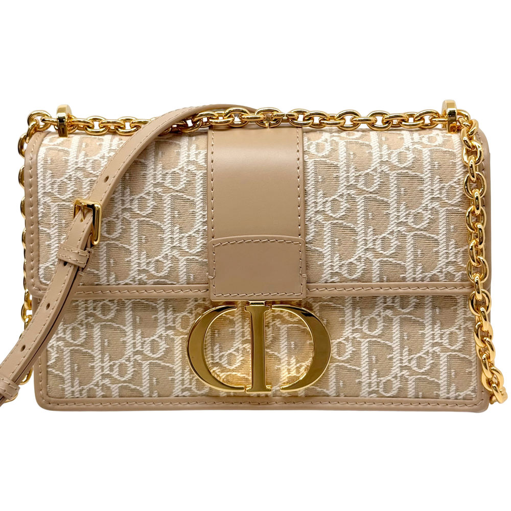 Pre-owned Dior mini bag, beige monogram back with leather strap and gold clasp
