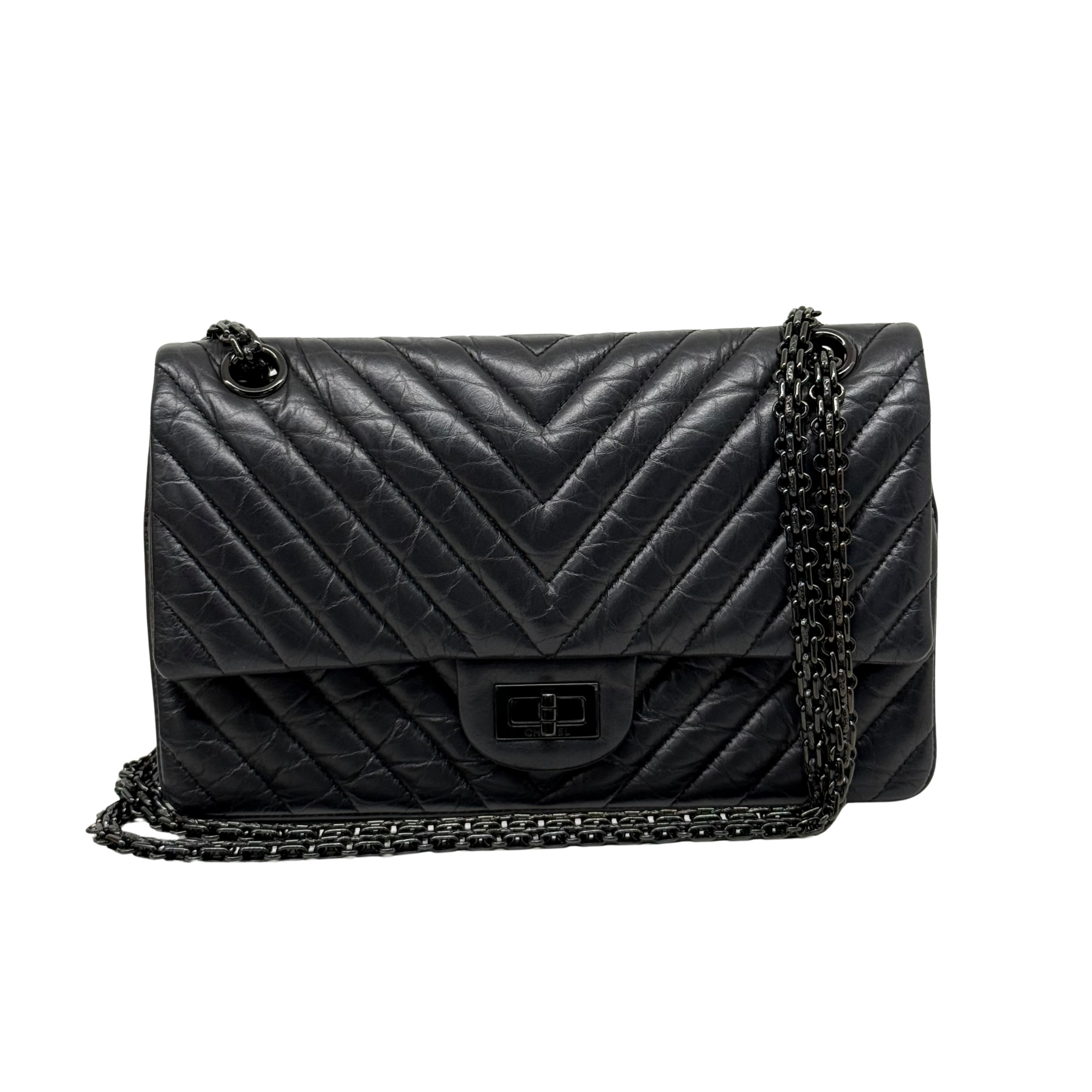 Chanel black bag black hardware triangle