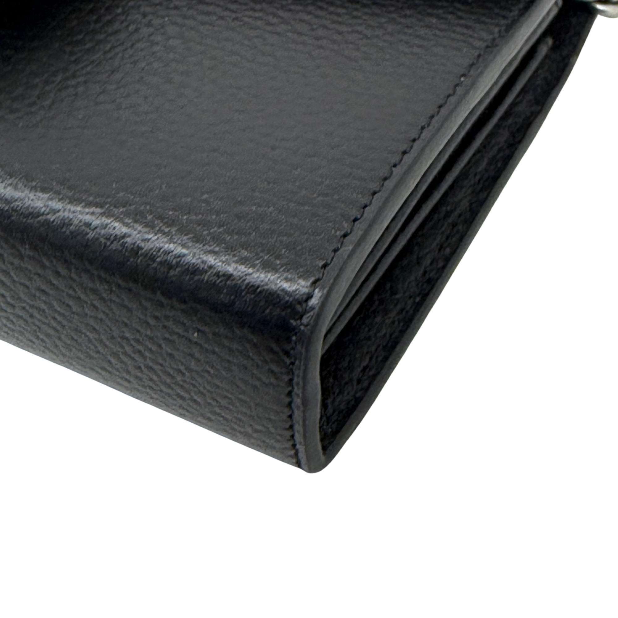 Gucci black leather clutch corner with stitched edge detail