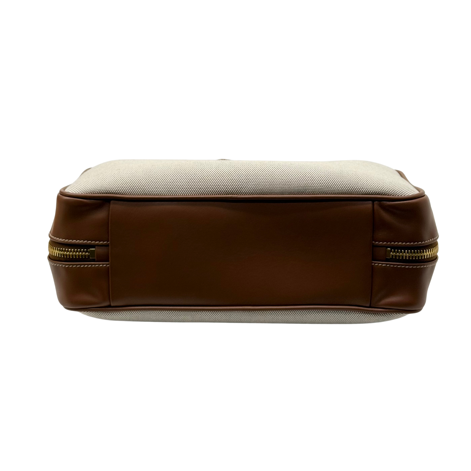 Miu Miu canvas duffel bag with brown bottom panel and top zipper