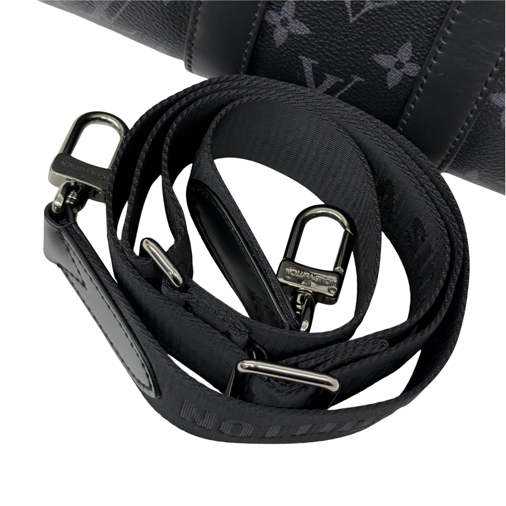 Black monogram bag strap with braided webbing and metal rings