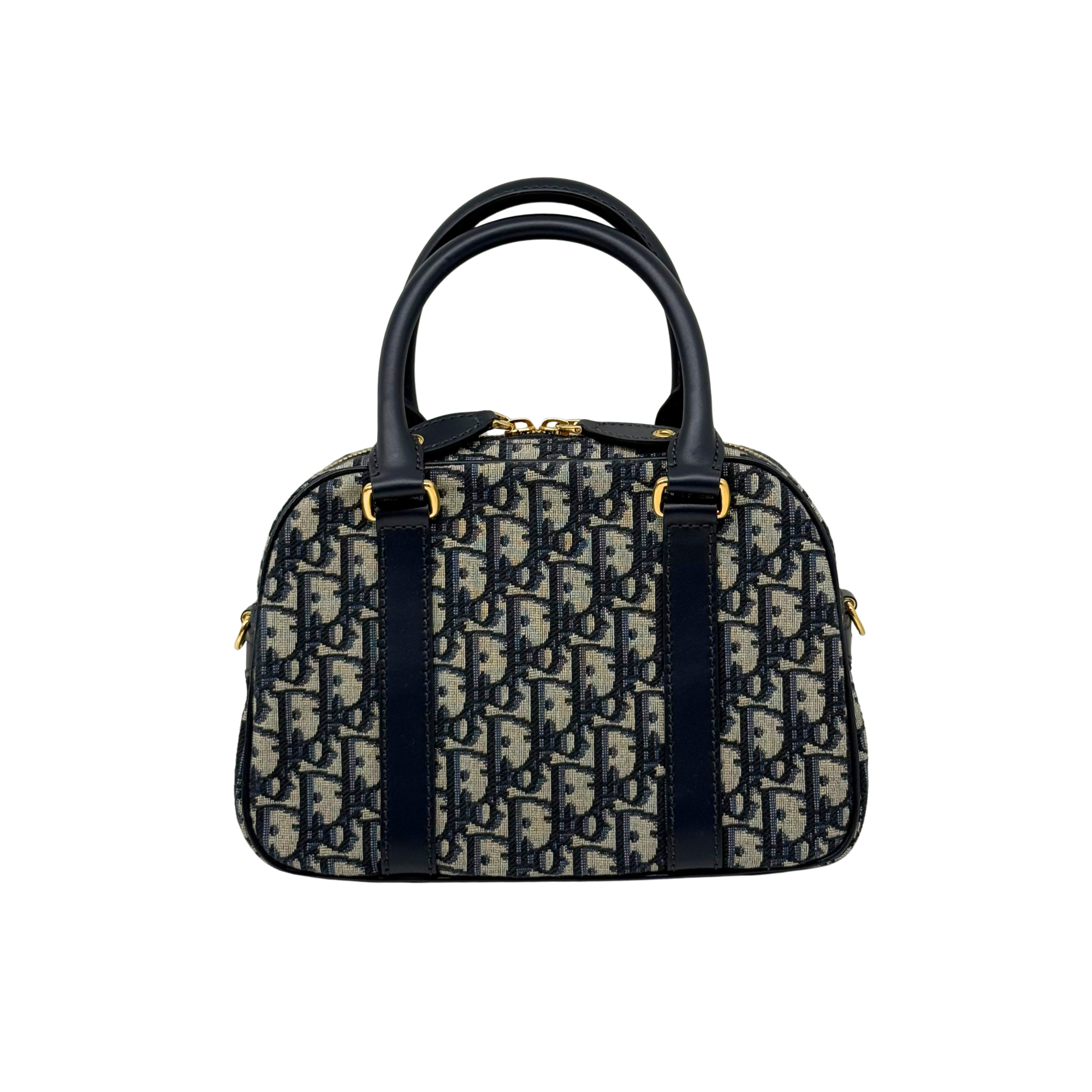 Dior mini duffel bag with navy handles, blue/cream monogram canvas, gold zipper