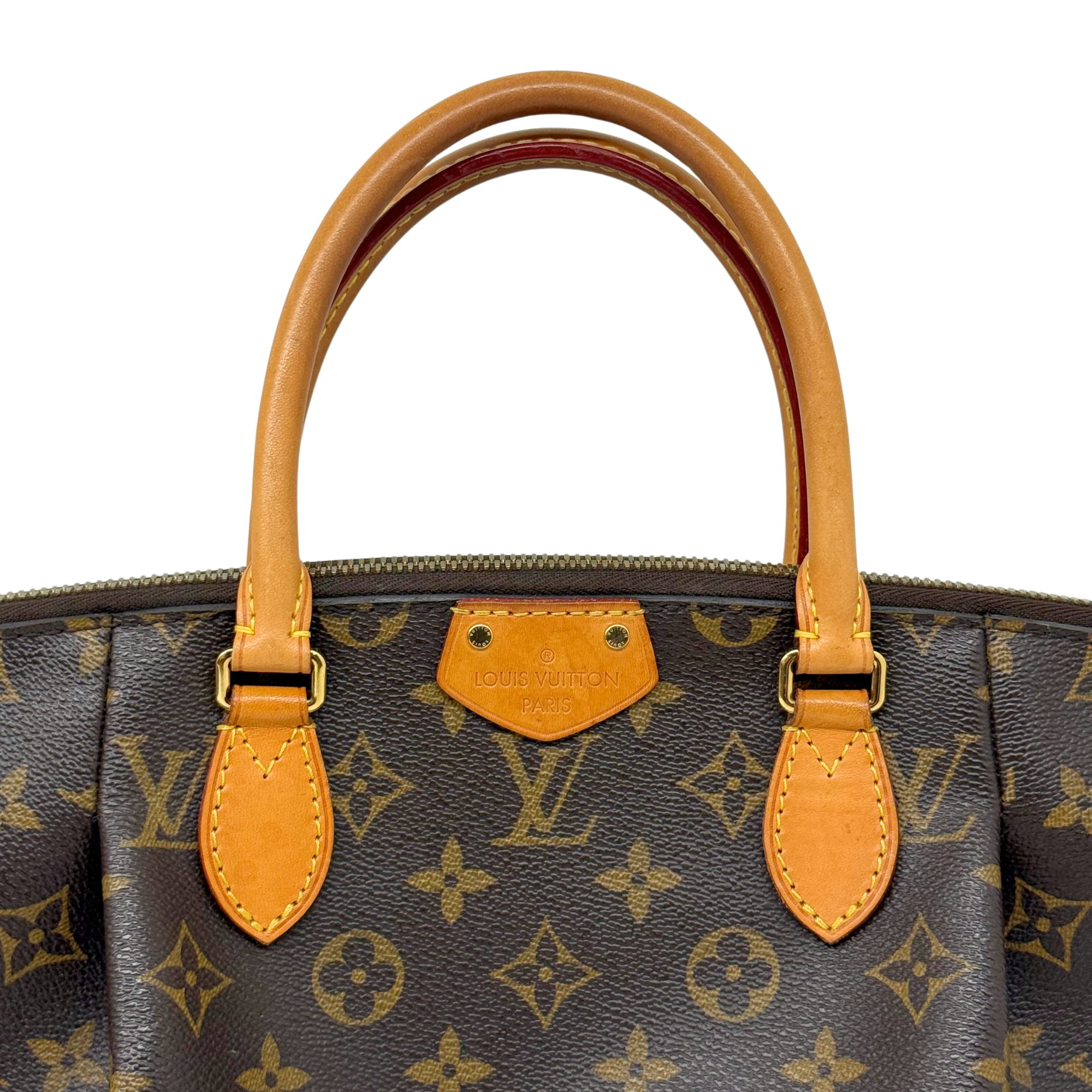 Louis Vuitton monogram tote with front nameplate, tan leather handles, zip closure