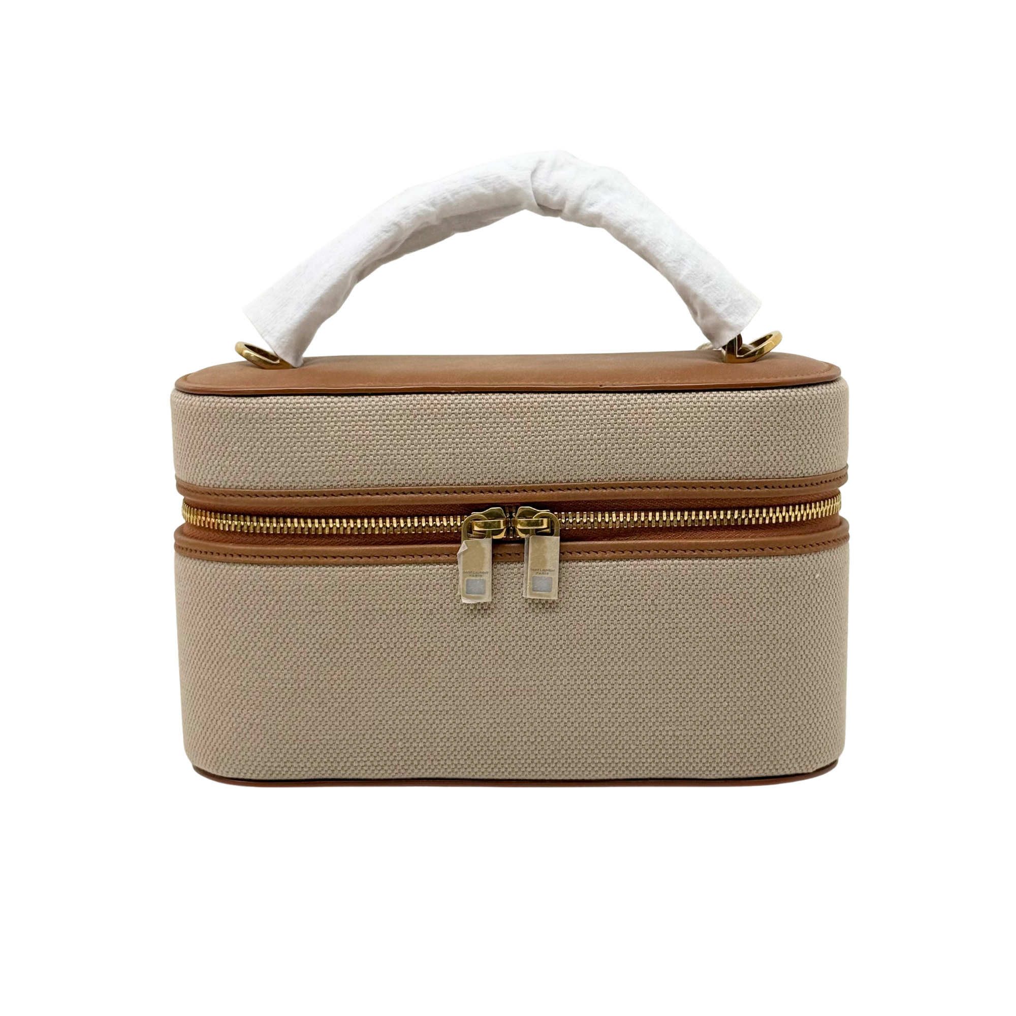 Beige canvas vanity bag with brown leather trim, top handle and two-way zip.