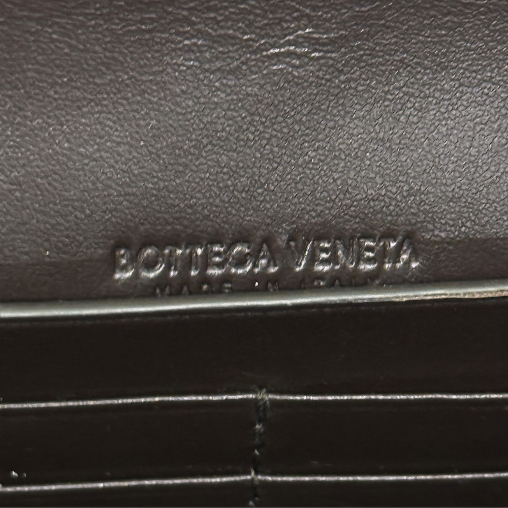 Bottega Veneta leather bag logo plaque on dark brown interior