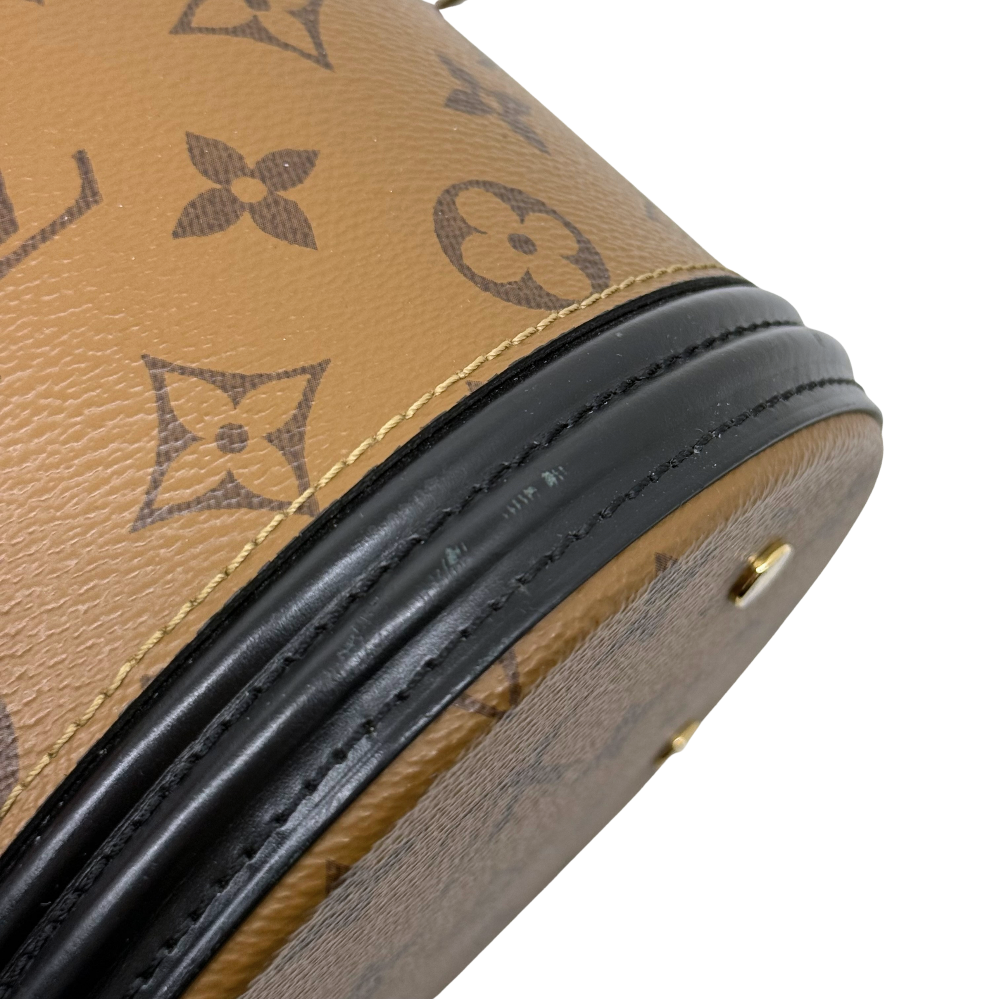 Louis Vuitton Cannes Monogram Reverse canvas bucket bag (pre-owned)