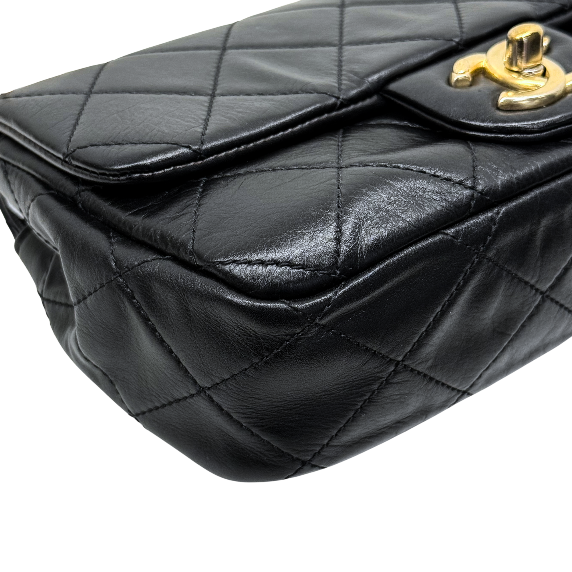 Chanel black bag with pearl strap