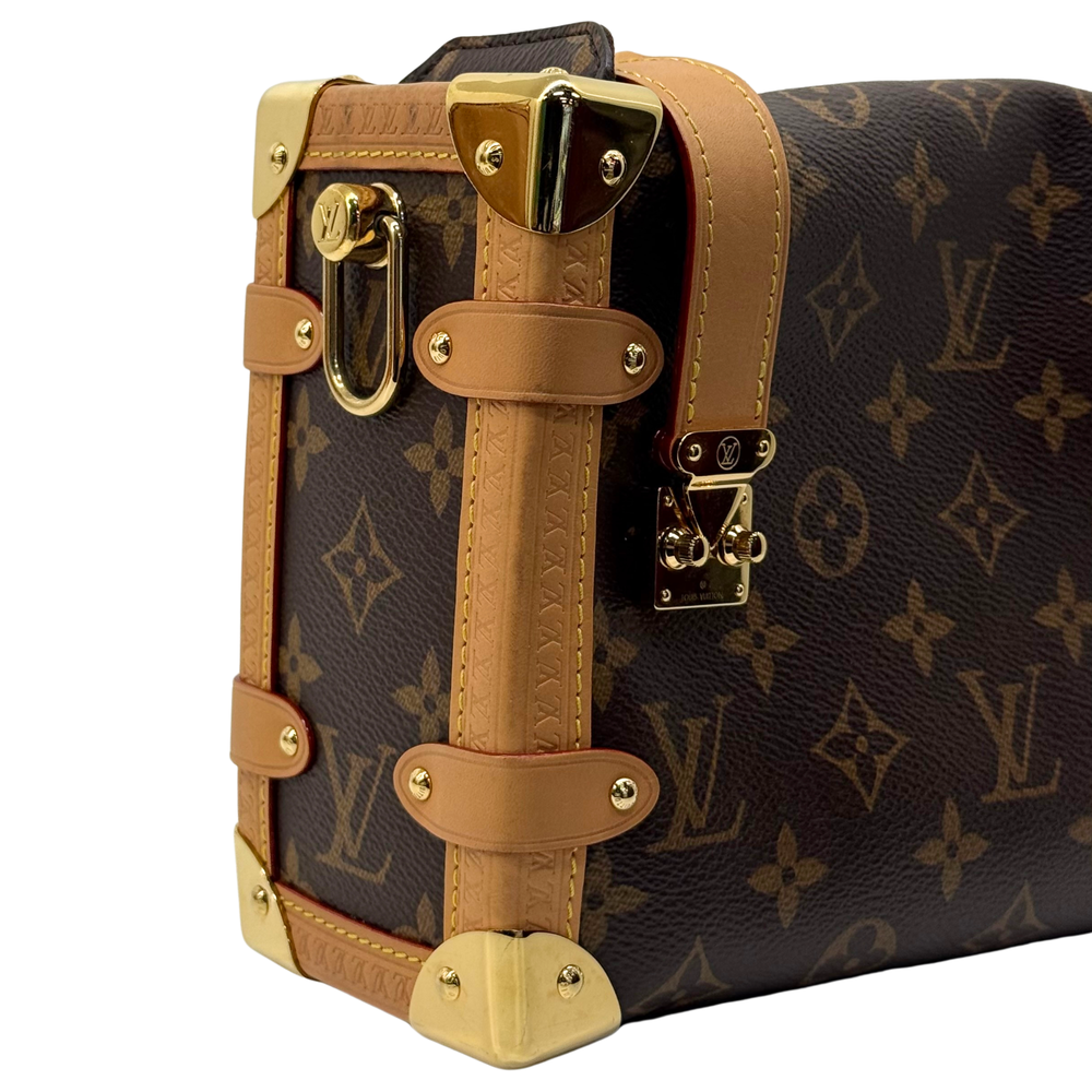 Louis Vuitton monogram mini bag with tan leather trim, gold-tone corners and clasp closures