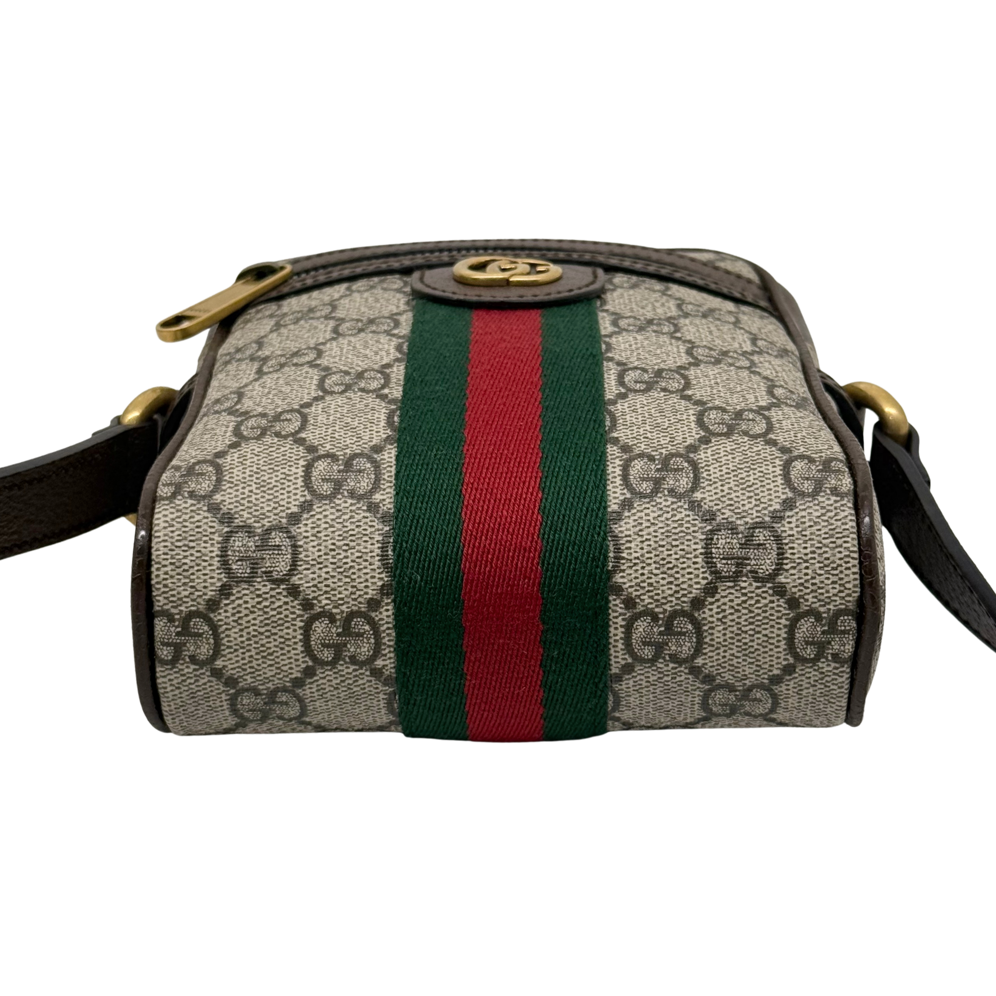 Gucci GG canvas crossbody bag side view with green and red web stripe and gold-tone hardware