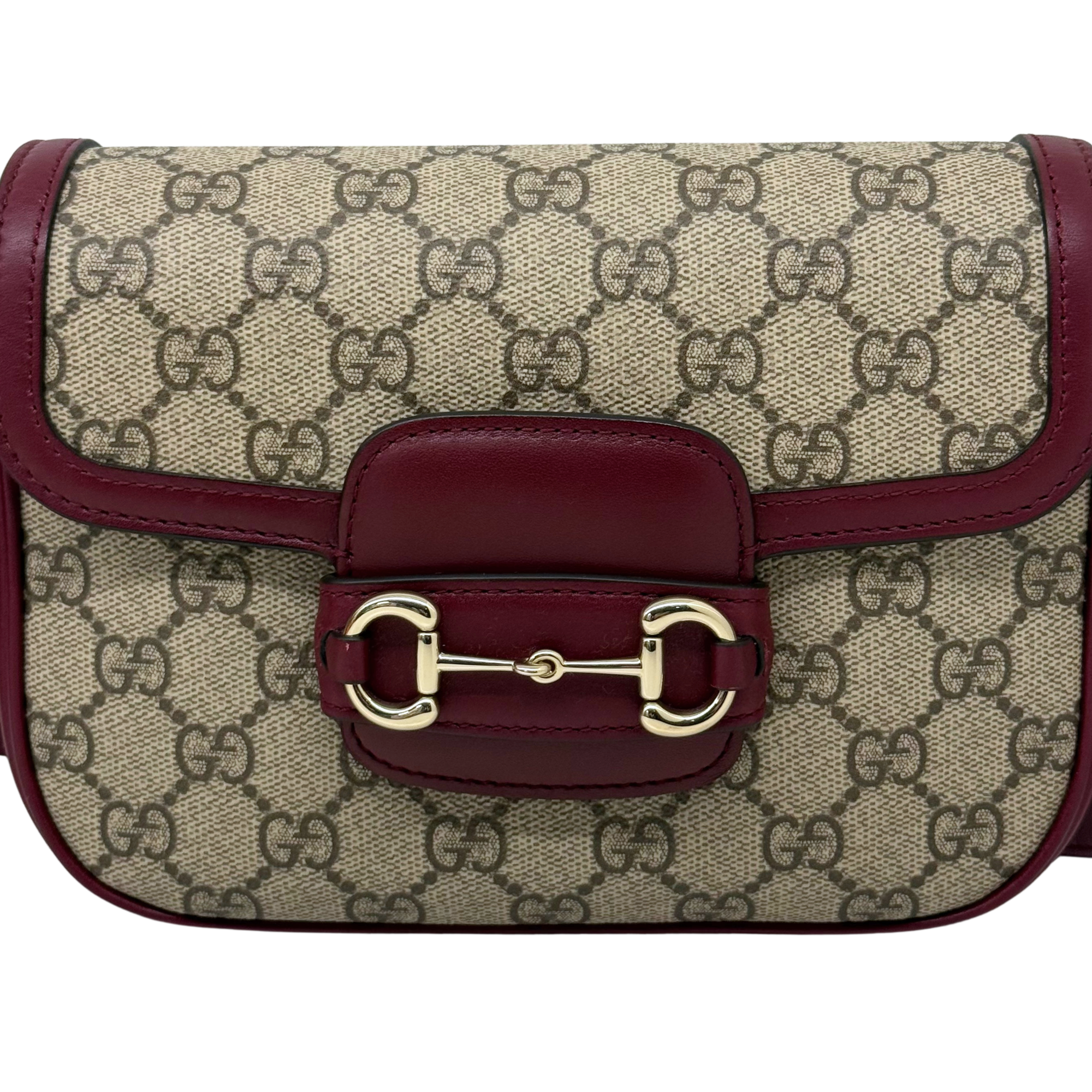 GG monogram shoulder bag with burgundy leather trim and front buckle