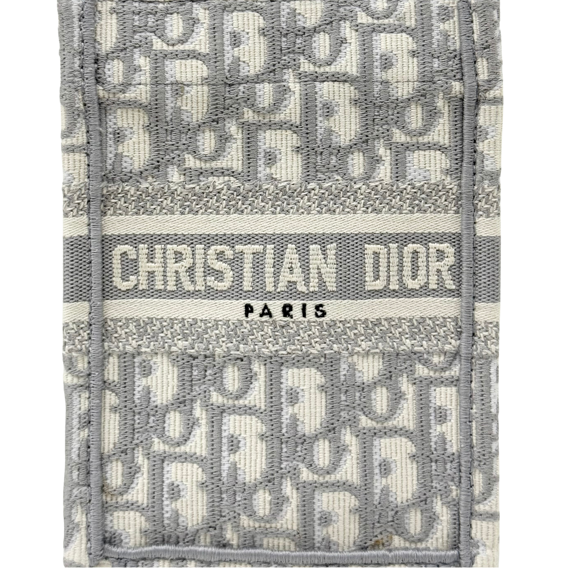 Dior jacquard tote front panel with "CHRISTIAN DIOR PARIS" print