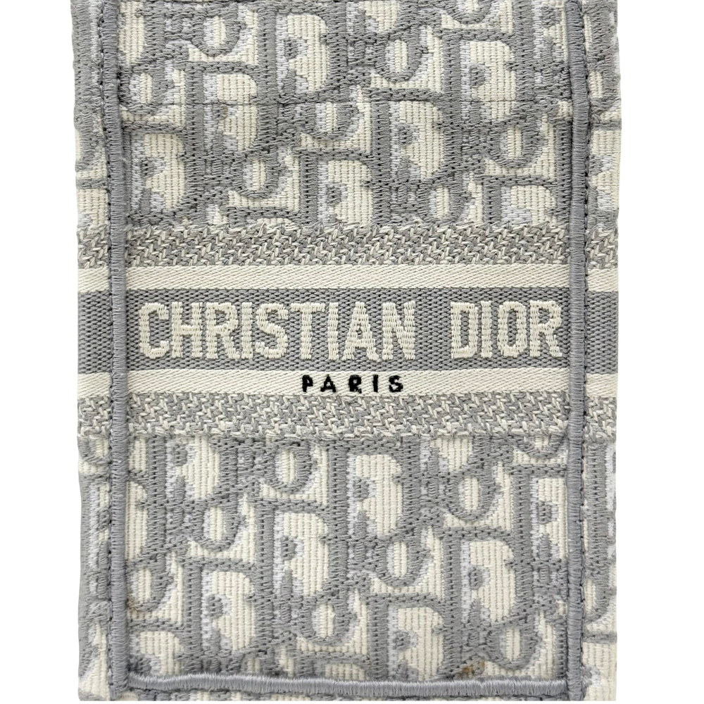 Dior jacquard tote front panel with "CHRISTIAN DIOR PARIS" print
