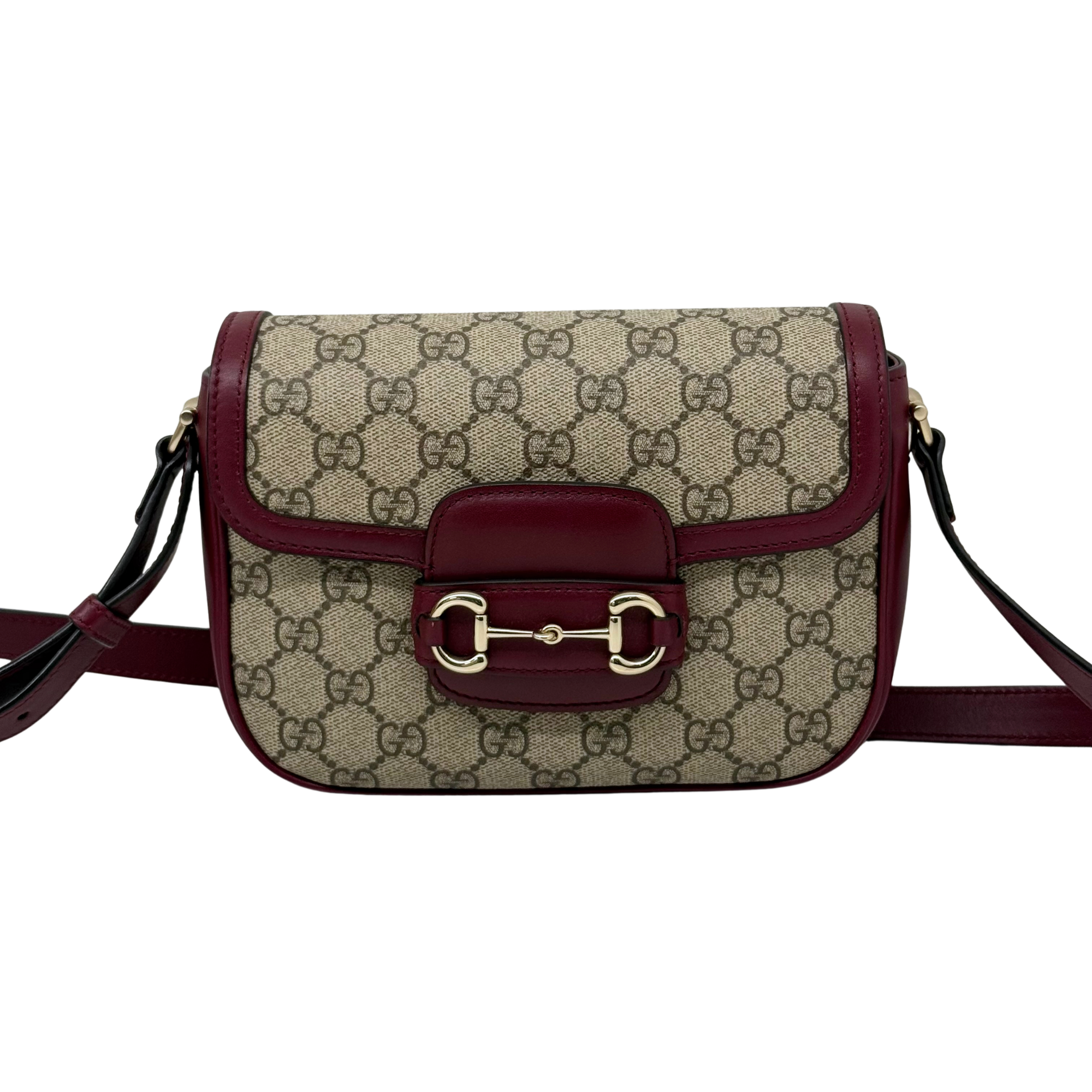 Burgundy leather strap GG monogram crossbody bag with front buckle