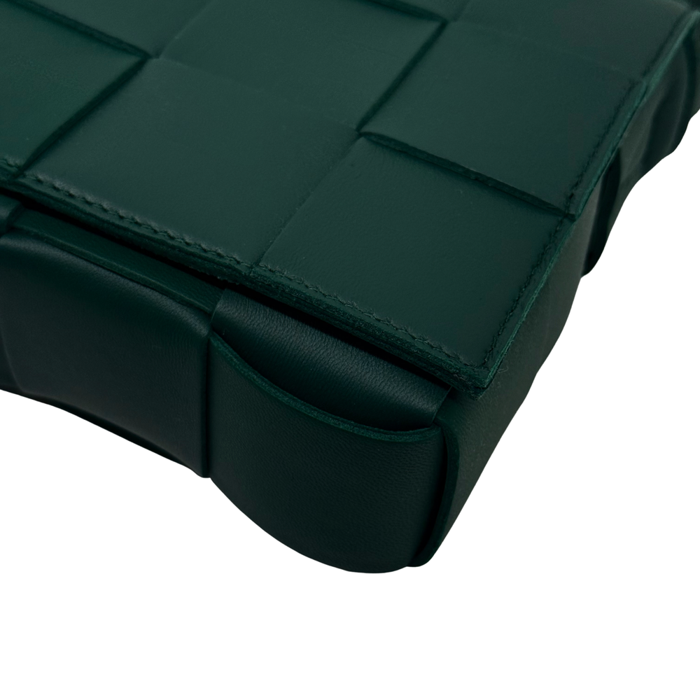 Green leather zipper edge with stitched front panel border