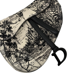 Black-and-white calfskin saddle bag with palm tree toile embroidery and black leather trim