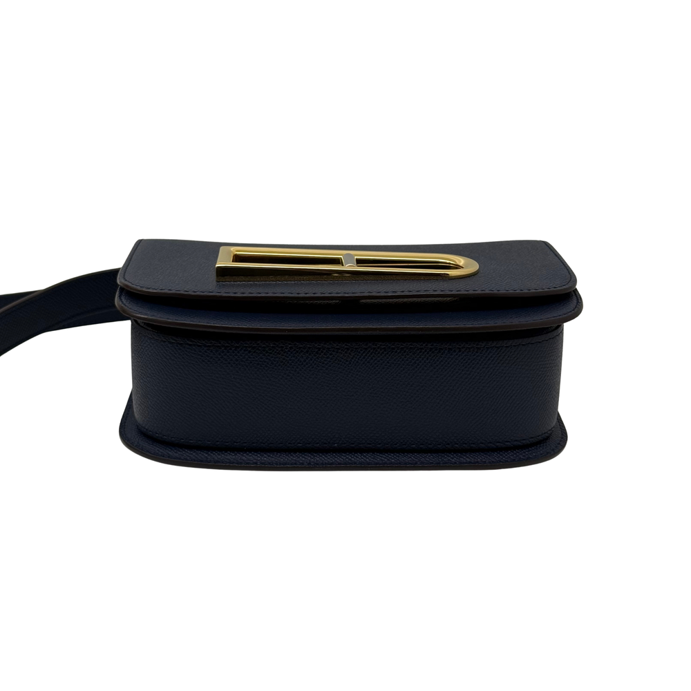 Pre-owned Delvaux bag top view with rolled strap and gold-tone buckle