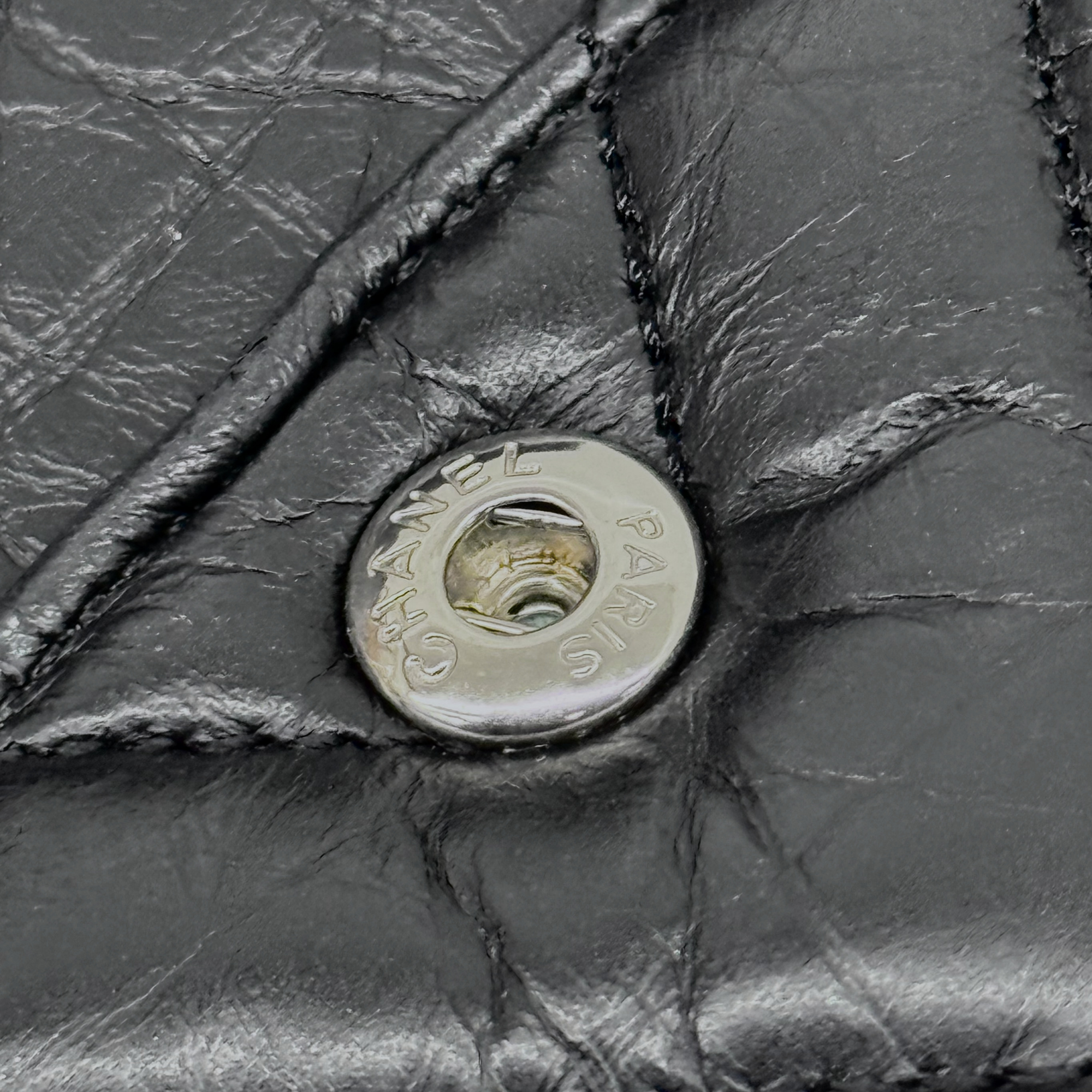 Chanel black bag black hardware triangle
