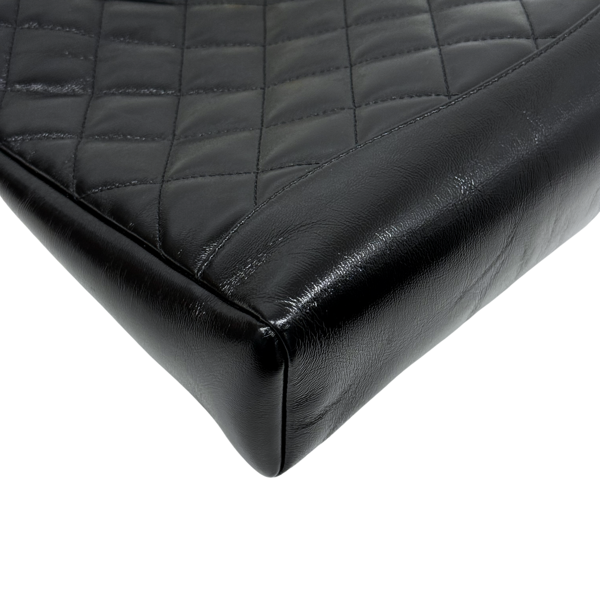 Chanel black bag leather handle