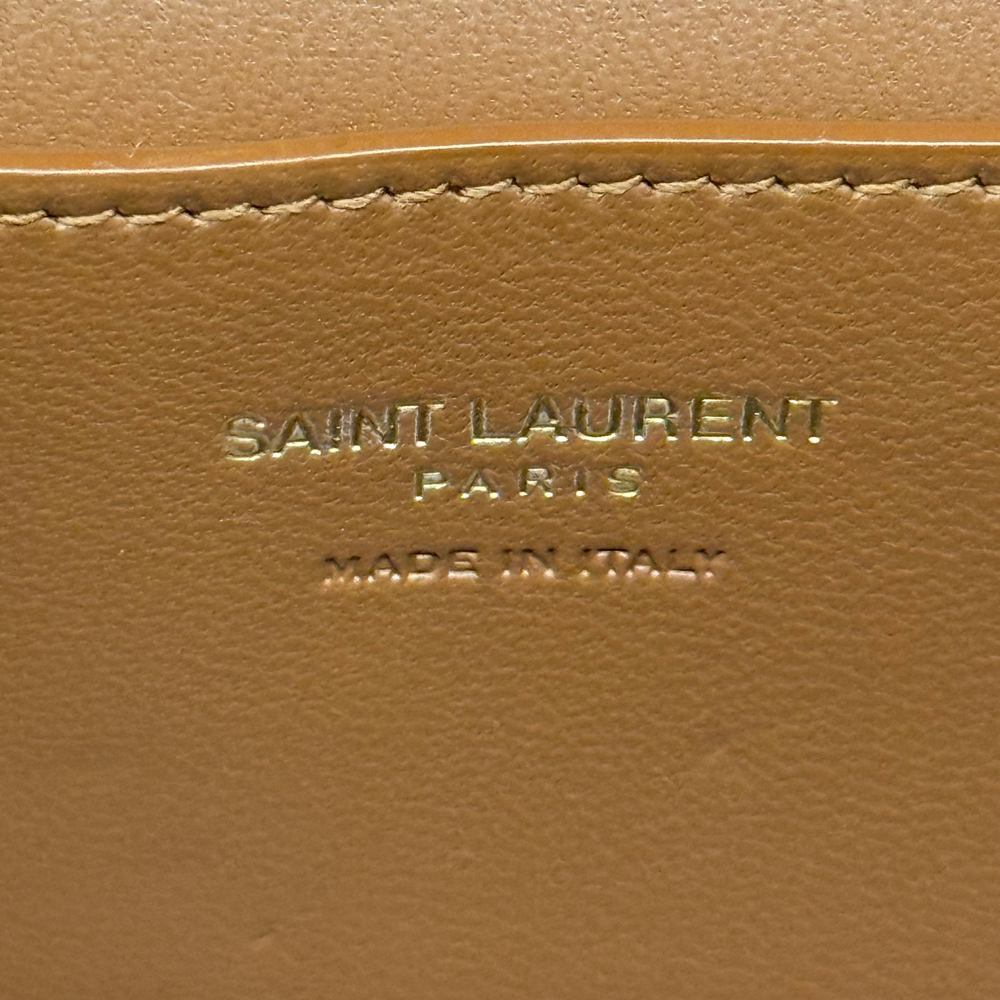 Beige canvas pouch with brown leather trim and Saint Laurent logo embossing