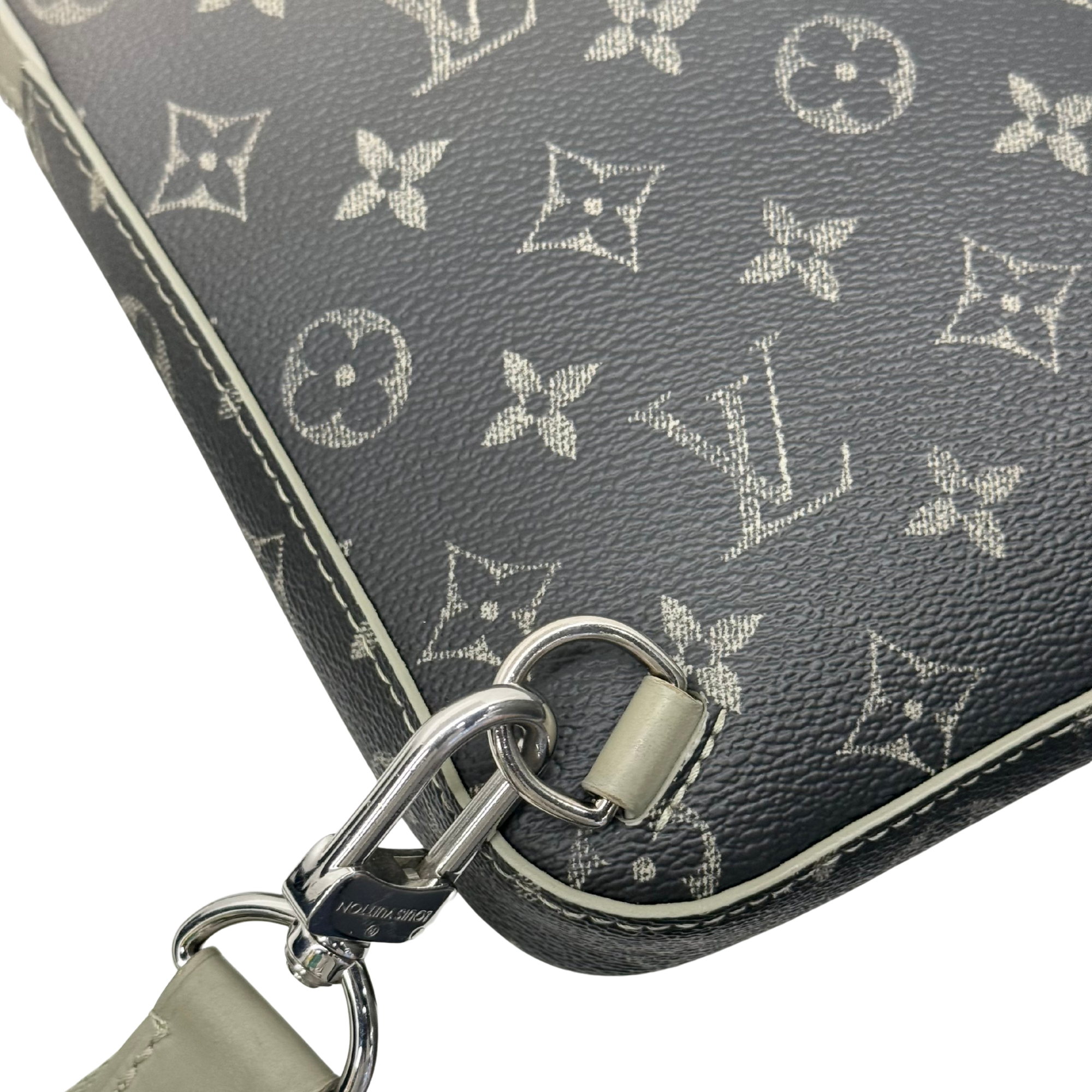 Pre-owned crossbody bag strap attachment with metal rings on monogram canvas