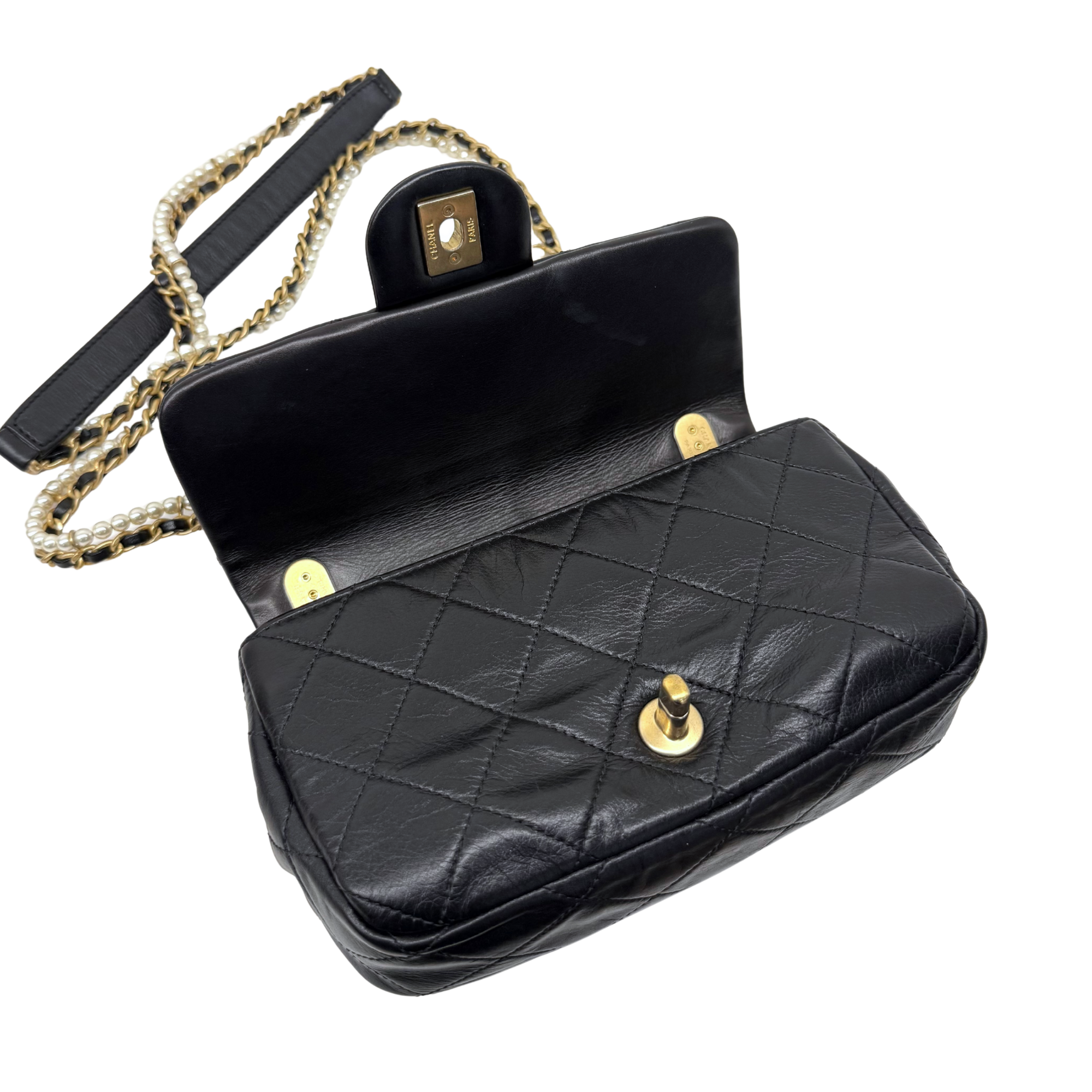 Chanel black bag with pearl strap