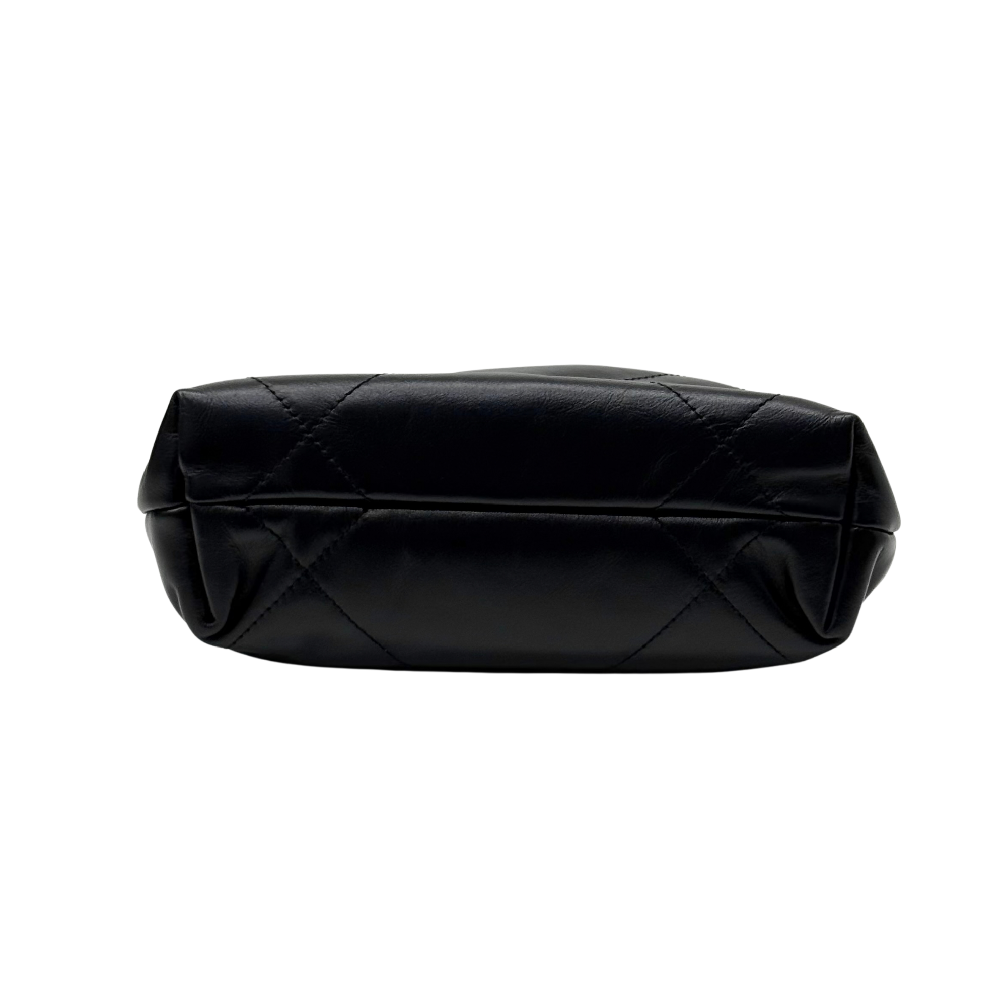 Black quilted mini crossbody bag, back view with smooth top panel and seam details.