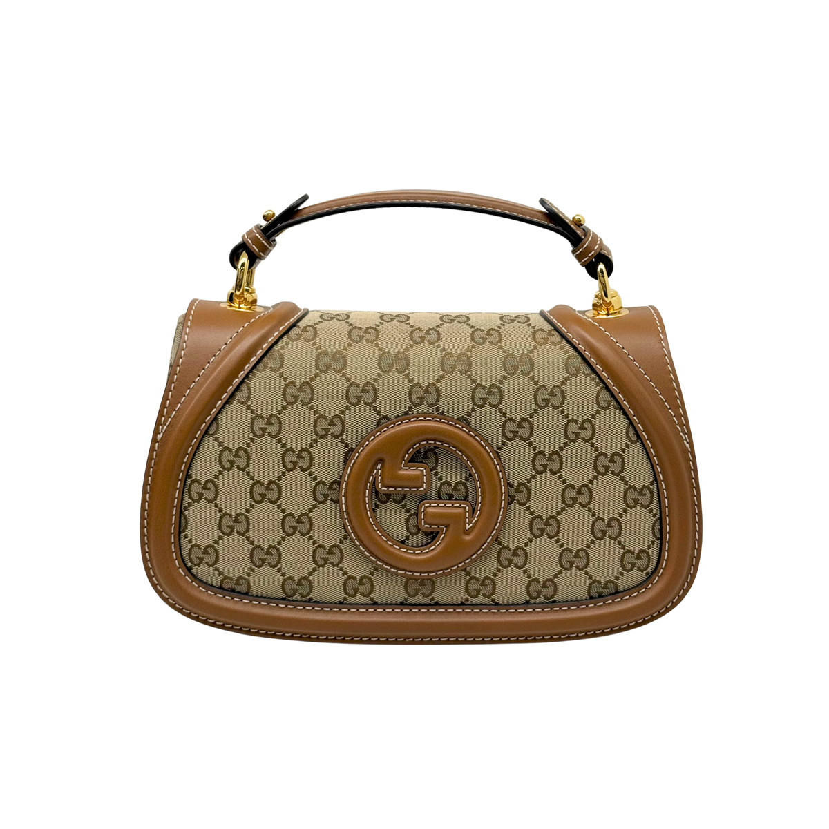 Monogram canvas mini shoulder bag with tan leather trim and gold logo emblem