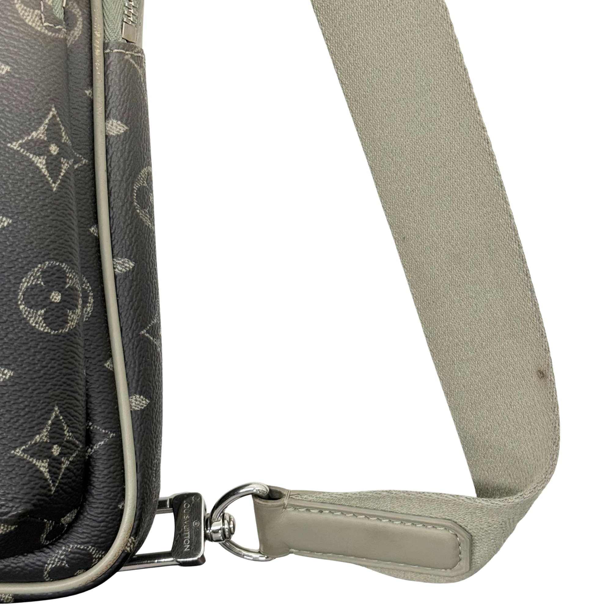 Louis Vuitton crossbody bag strap with silver ring hardware and zipper edge
