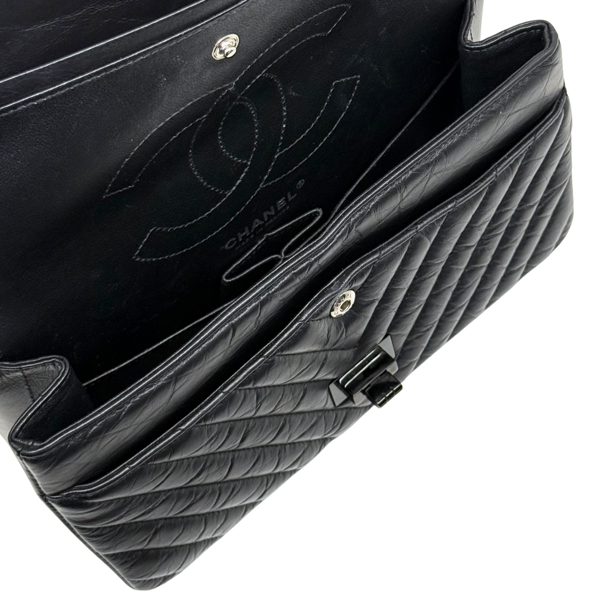 Chanel black bag black hardware triangle
