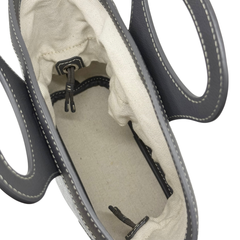 Pre-owned Goyard bag interior view with beige lining and black zip pull