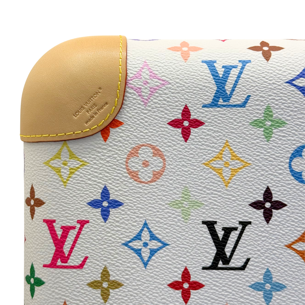 Louis Vuitton monogram suitcase corner with beige leather trim and multicolor pattern