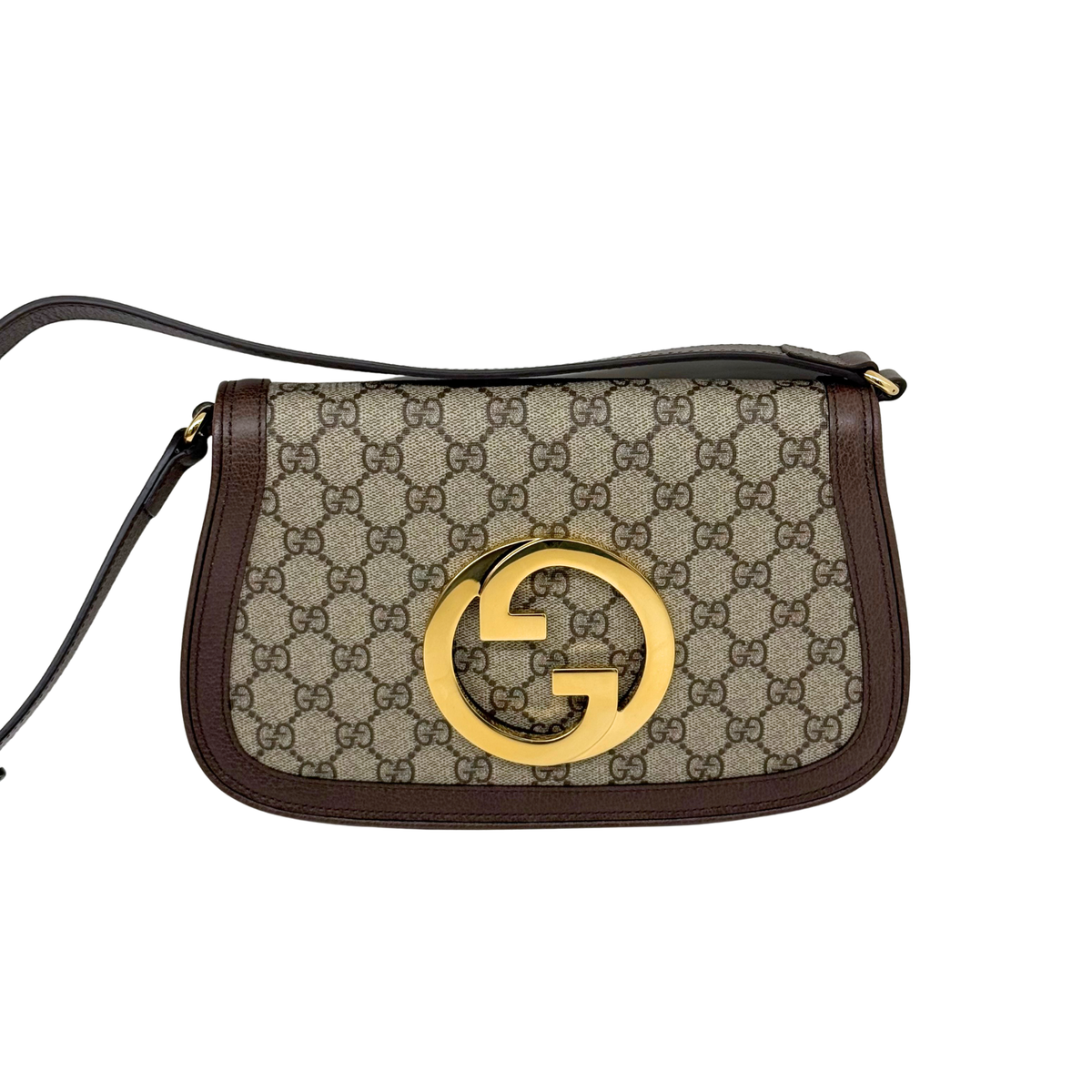 Gucci GG canvas crossbody bag with gold double-G front logo and brown strap