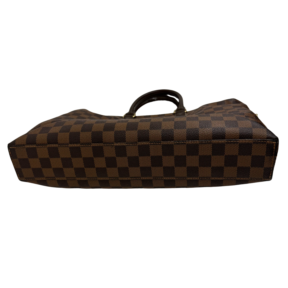 Pre-owned Louis Vuitton checkered handbag on its side with top handle and long profile