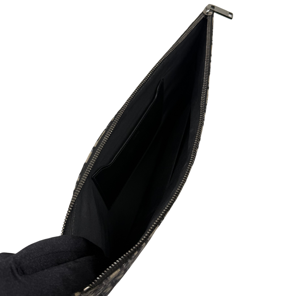 Dior pre-owned zipper pouch with black fabric interior and gold-tone zipper track