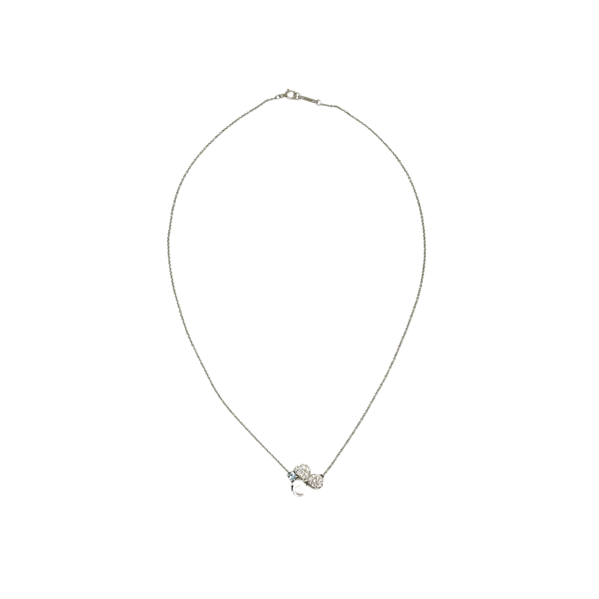 Silver-tone necklace with small heart pendant set with clear gemstones