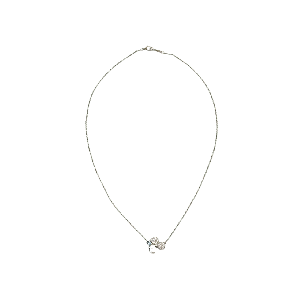 Silver-tone necklace with small heart pendant set with clear gemstones