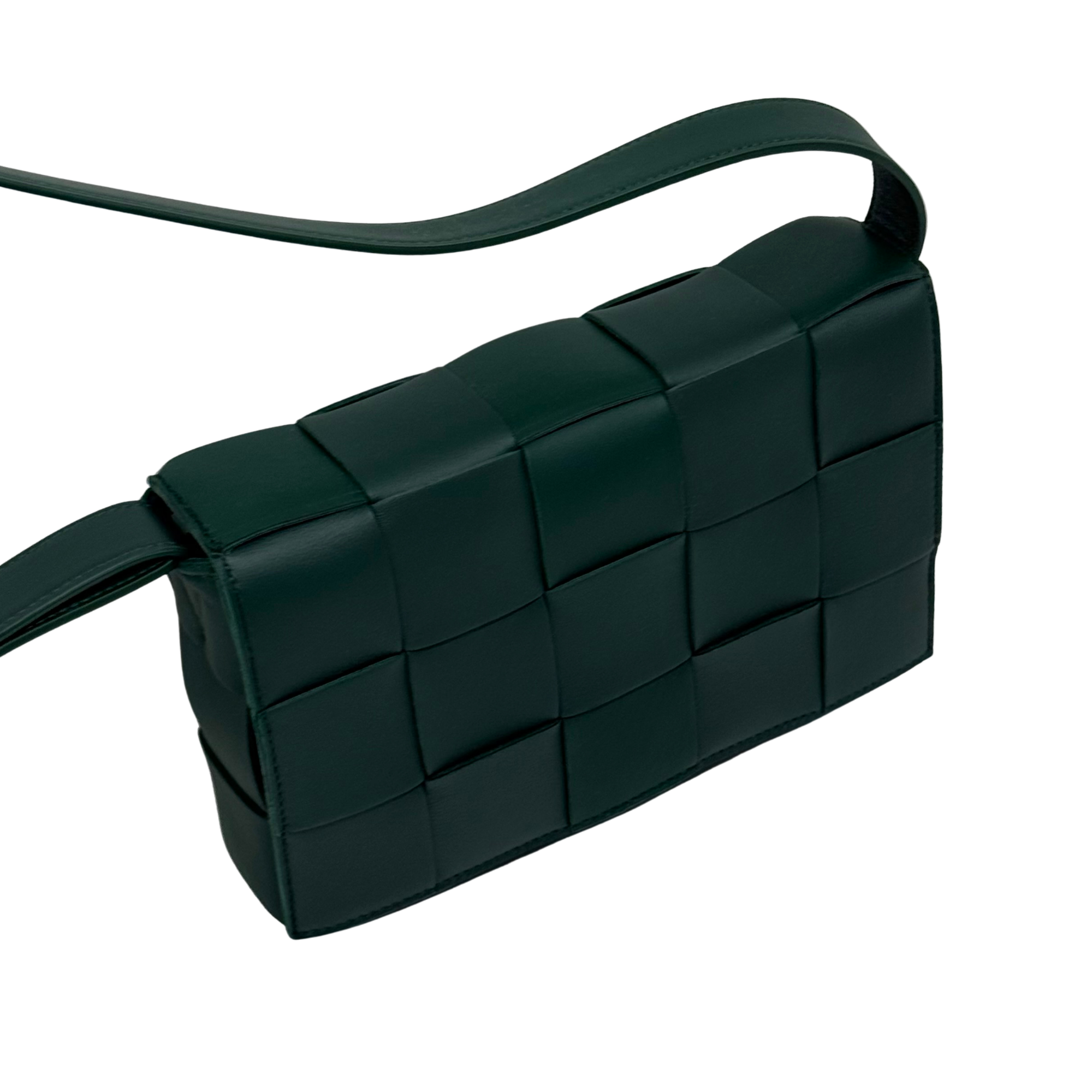 Dark green woven leather shoulder bag with top strap and quilted square panels