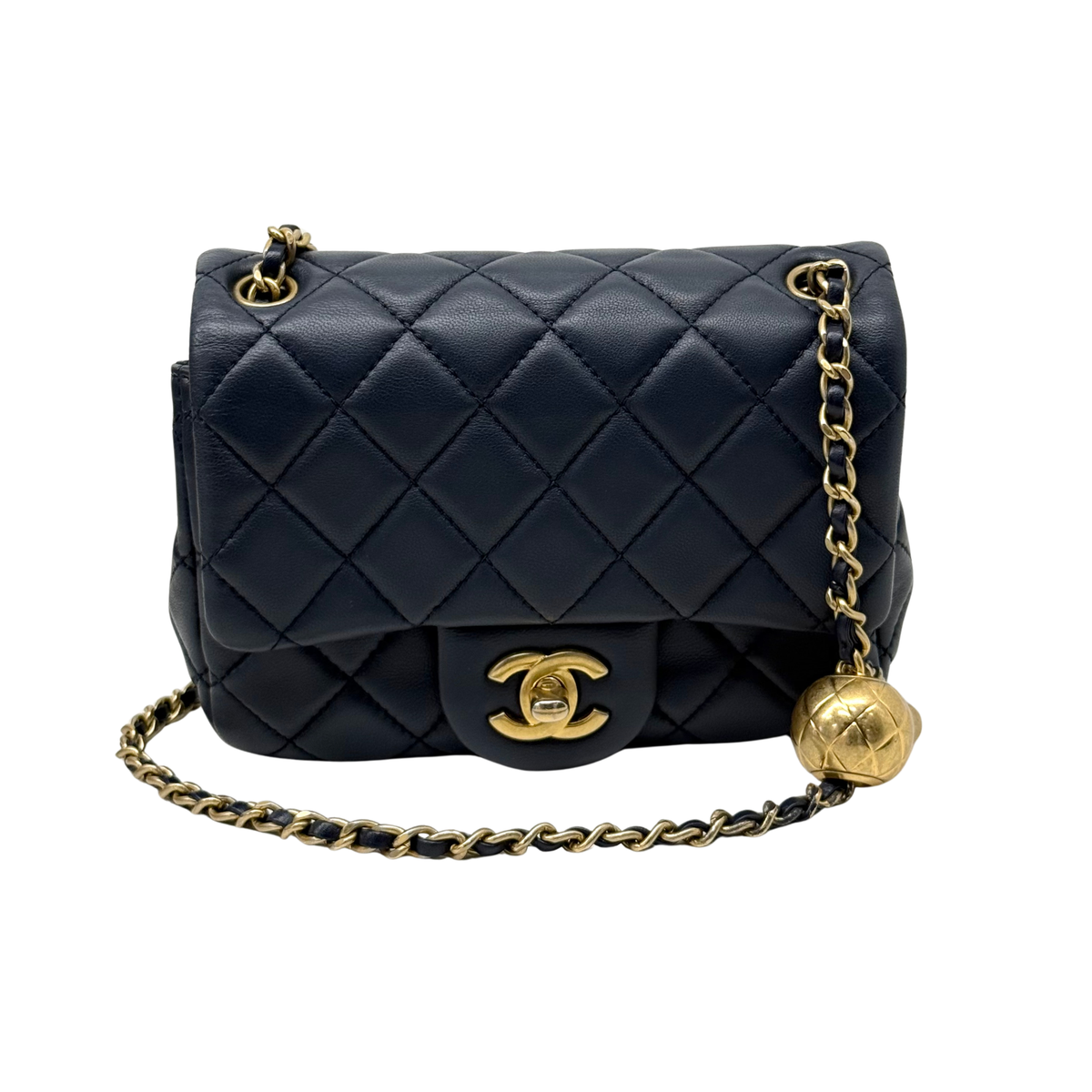 Navy quilted mini square flap bag with gold Chanel CC logo and shoulder chain
