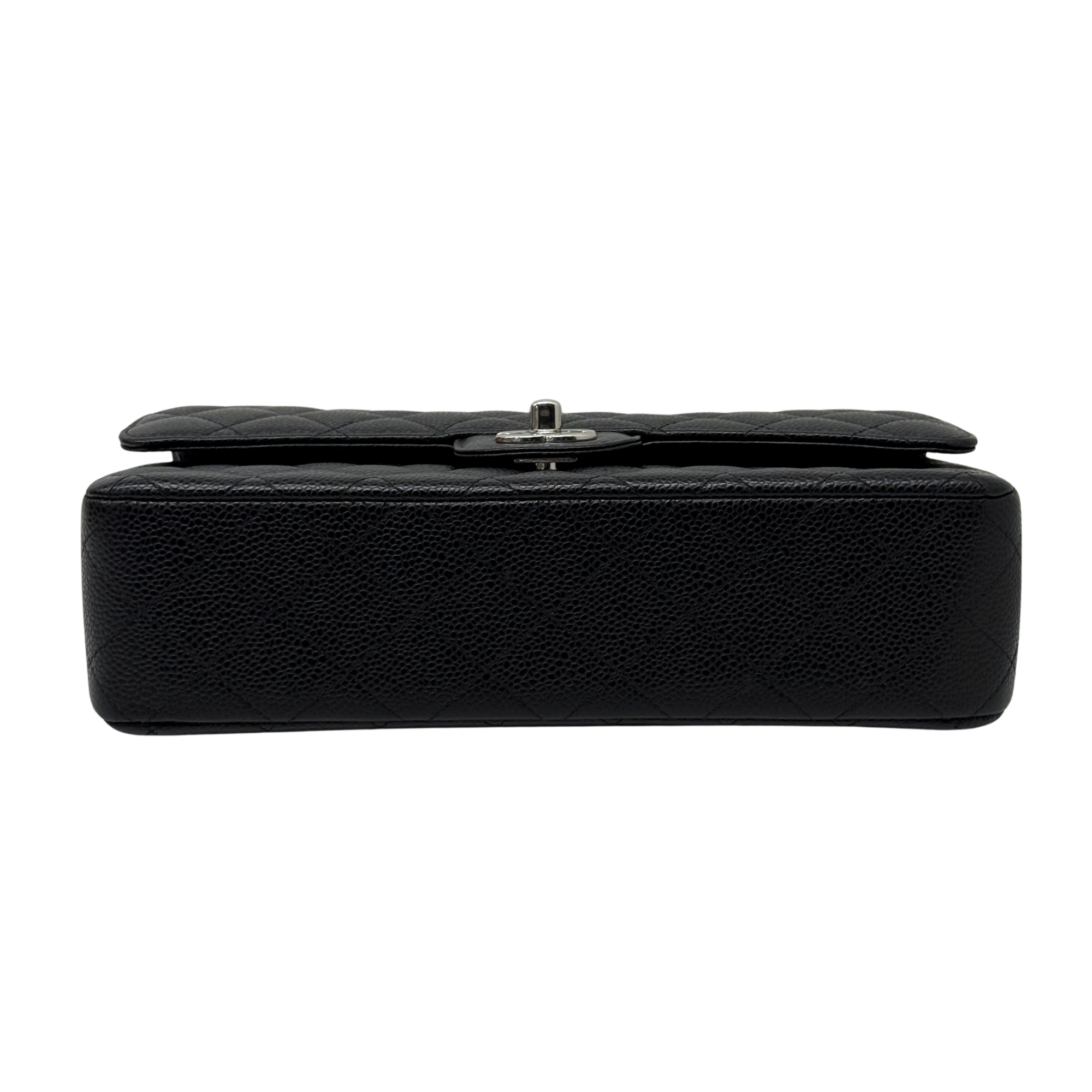 Black leather shoulder bag with snap closure and smooth top handle