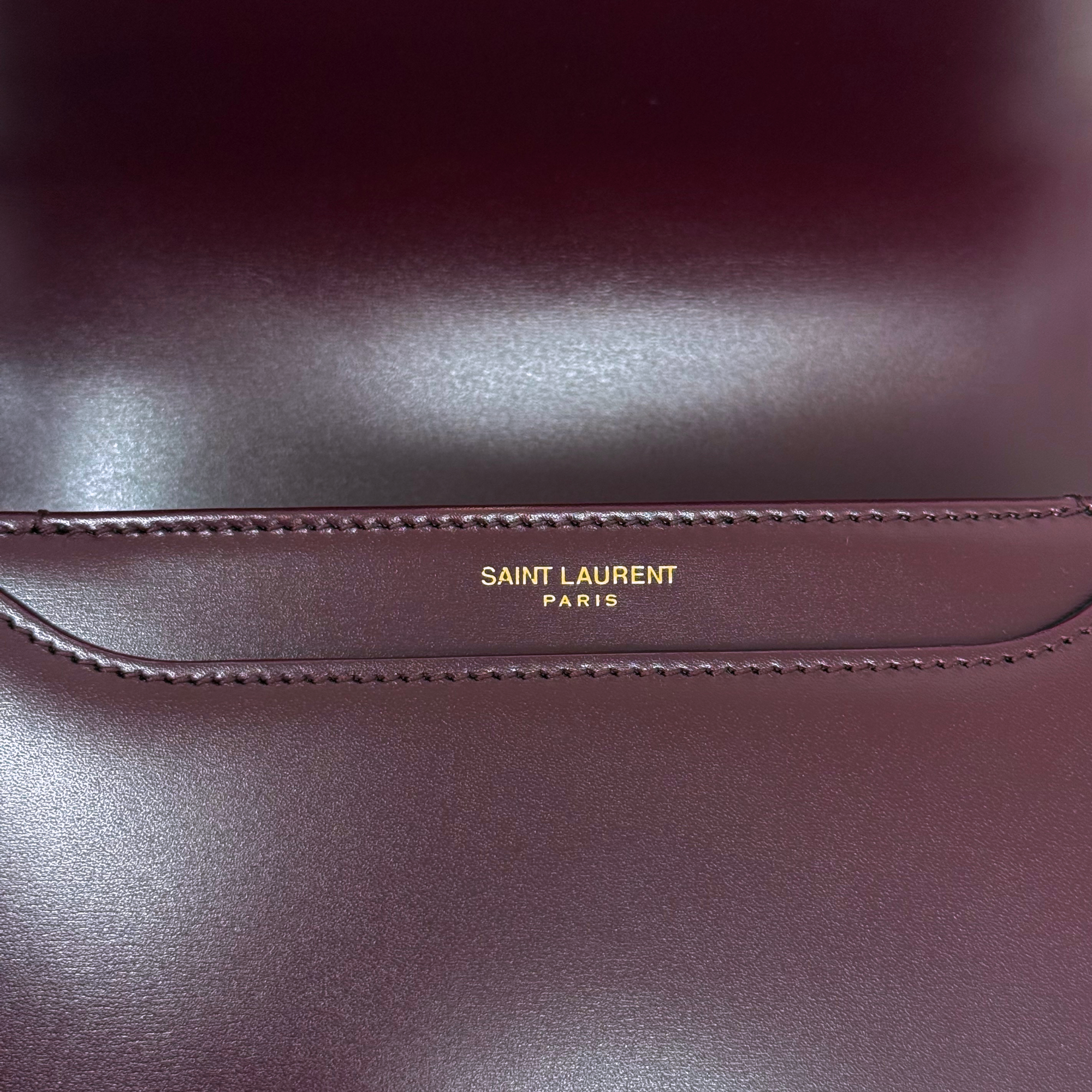 Saint Laurent Le 61 Besace bag stitching detail with 'SAINT LAURENT PARIS' embossing