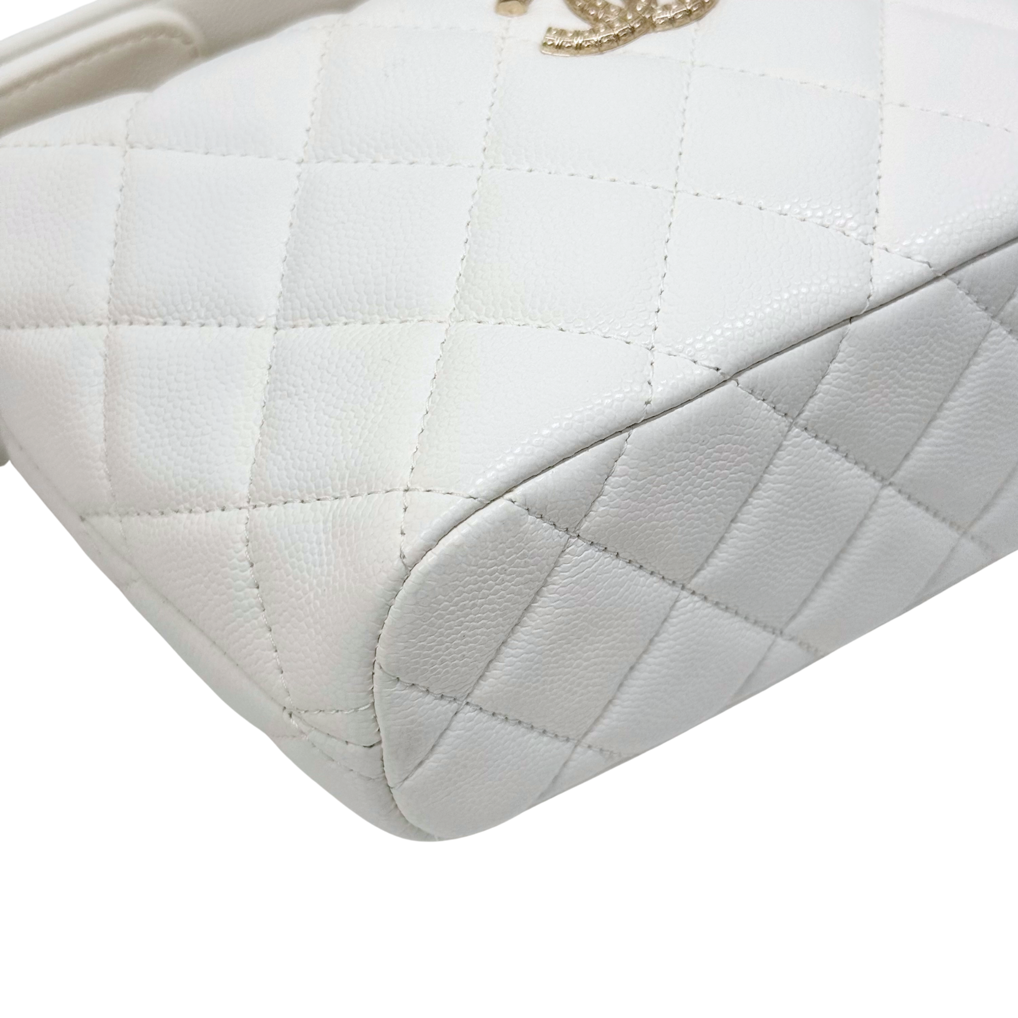 Chanel quilted white leather bag corner with diamond stitching