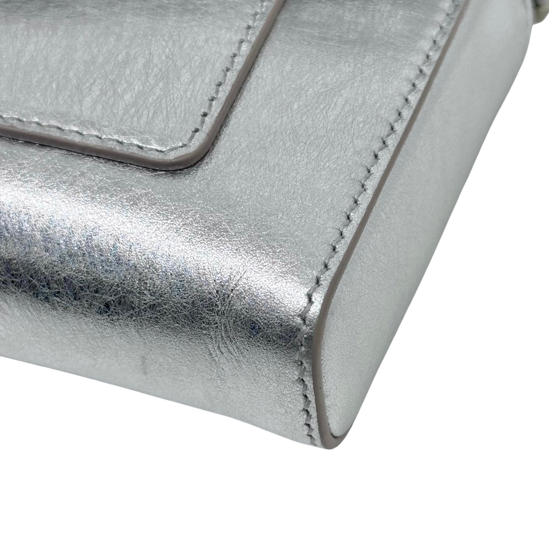 Pre-owned Blvgari silver metallic bag corner, detailed stitching and folded leather edge