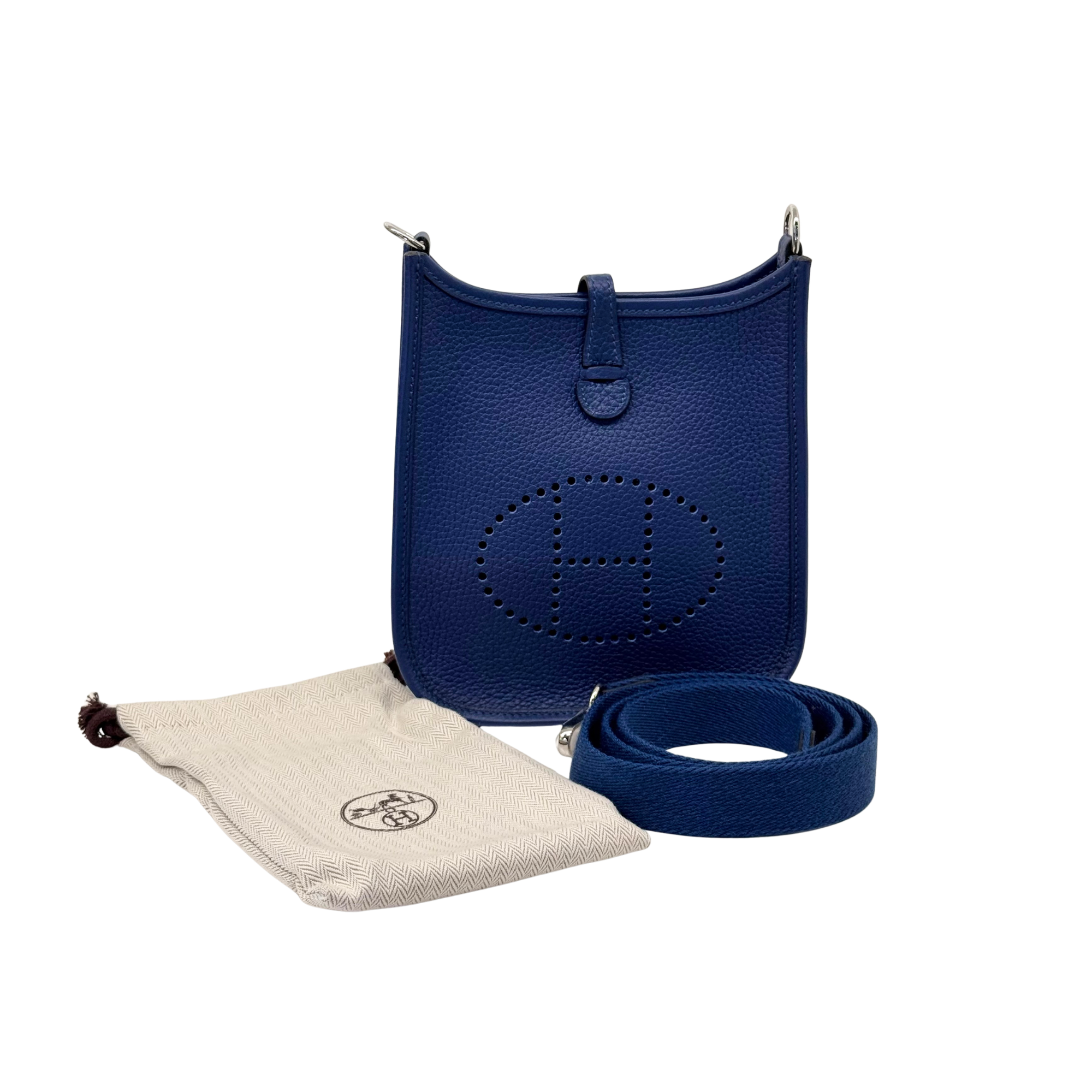 Navy blue Evelyne 16 crossbody bag with adjustable strap and matching dust bag