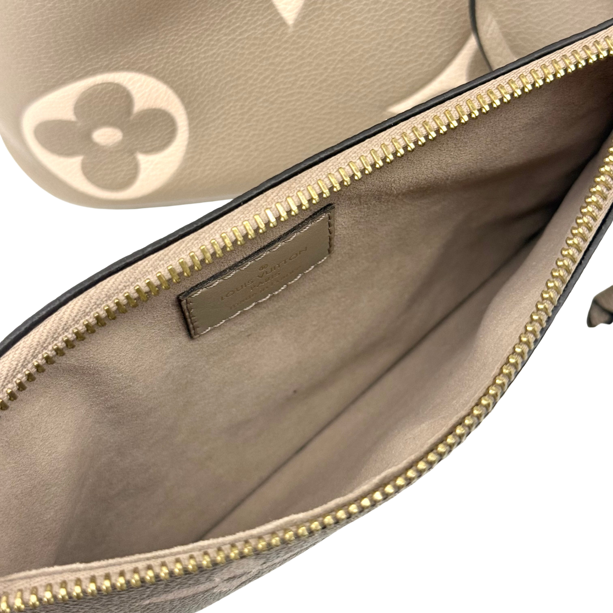 Louis Vuitton Monogram Giant Bicolor Empreinte Neonoe MM bucket bag (pre-owned)
