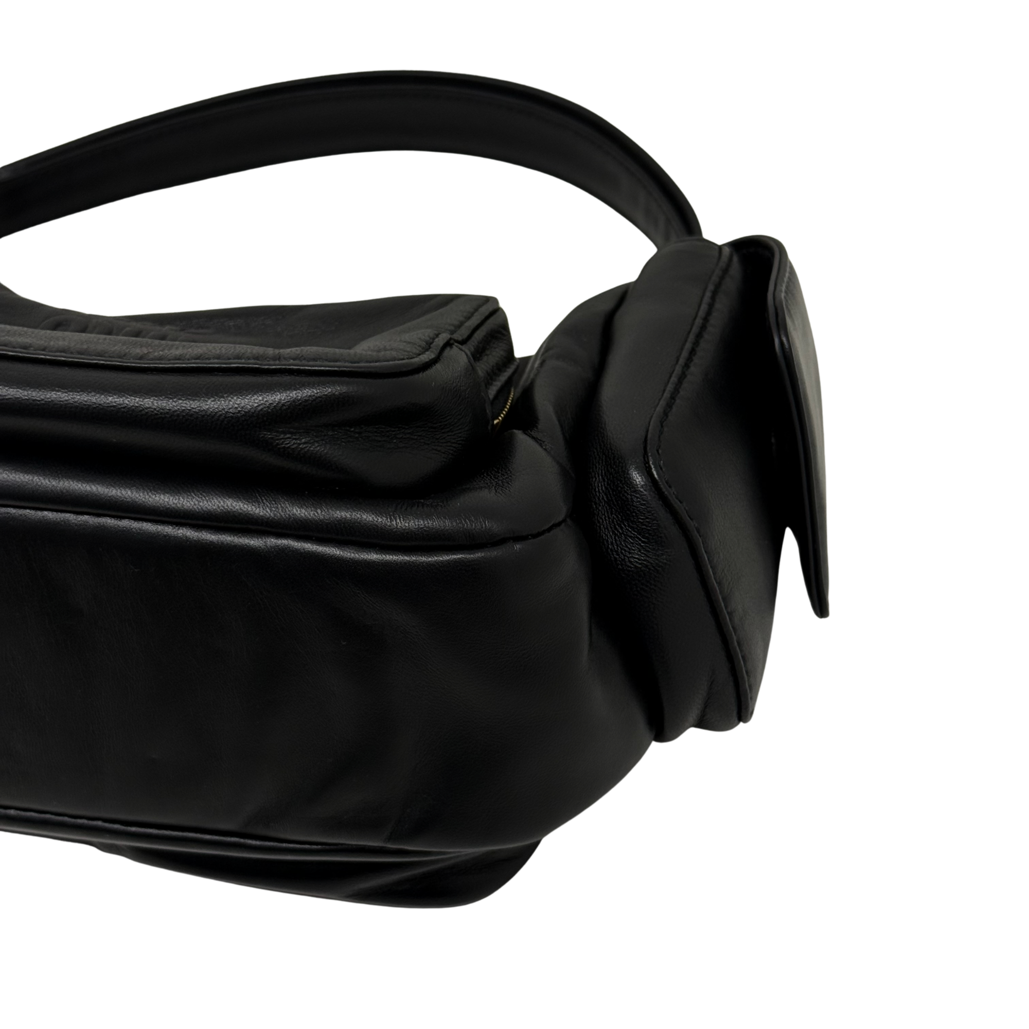 Black leather shoulder bag with curved top handle and padded side
